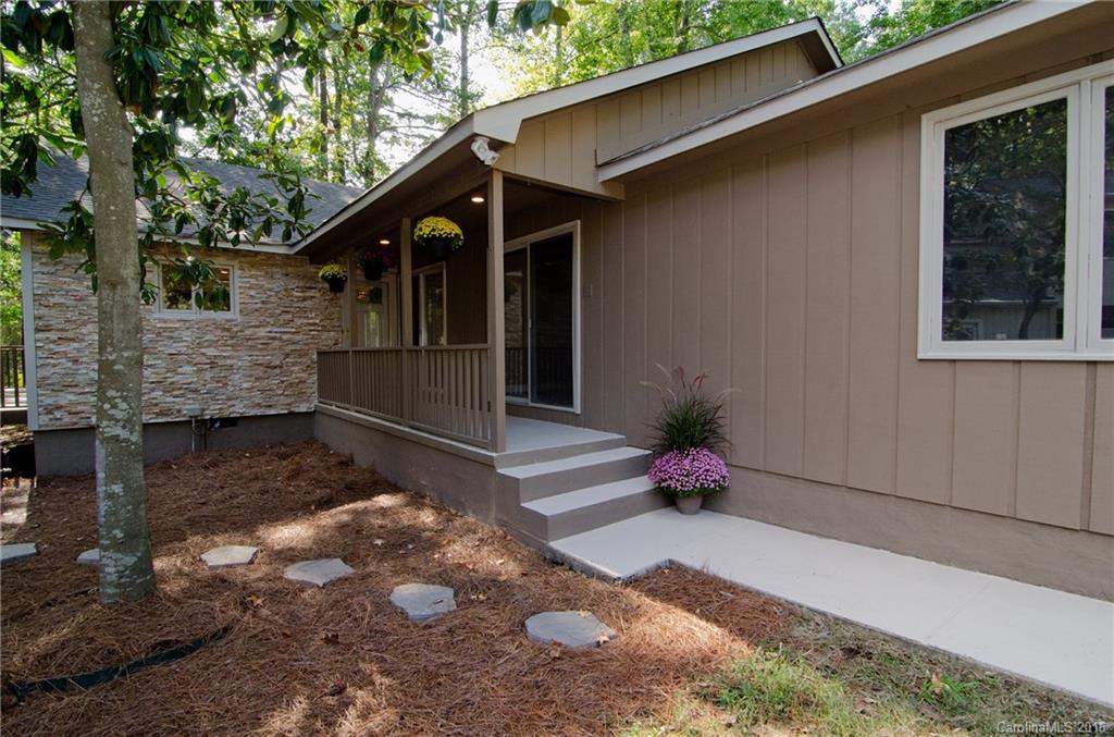 Amazingly remodeled and completely renovated RANCH with seasonal water views in RIVER HILLS!!!  Entire home has been taken to the studs and redone.  Hardwoods in kitchen, great room & dining room.  New carpet in bedrooms & office.  Impressive master bath with seamless walk in shower, dual vanities and endless tile.  Stacked stone fireplace highlights great room and sunroom, large various decks to enjoy the outdoors. Home has great flow and sunny kitchen that also opens to deck.  New garage door!