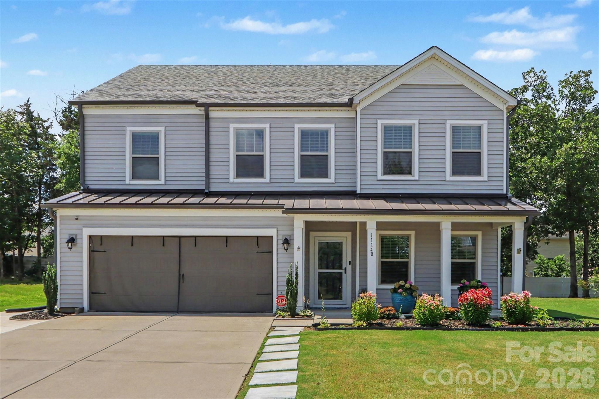 Rarely does a home combine the space today's move-up buyer's need with the flexible floor plan they've been searching for. Welcome to 11140 Comiskey Lane—a beautifully maintained true 5-bedroom, 4-full-bath home in Charlotte's sought-after Haywyck Meadows community. If you've been searching for the quintessential Charlotte move-up home that offers space, flexibility, and an exceptional location, you've just found it.
(Tax records aren't telling the full story, the is a 5/4 not a 4/3)

This home truly LIVES LARGER. Thoughtfully designed for today's lifestyle, it features a desirable main-level bedroom with access to a full bath, plus a private upstairs en-suite that's perfect for guests, multi-generational living, a returning college student, or an exceptional work-from-home retreat. Two additional secondary bedrooms share a well-appointed full bath, while the spacious primary suite offers a peaceful, retreat-like atmosphere complete with a luxurious five-piece bath, generous walk-in closet, and the comfort you've earned at the end of the day.

The oversized loft adds even more flexibility, making the perfect media room, game room, fitness studio, home office, children's playroom, or creative hobby space. Whatever stage of life you're in, this floor plan adapts beautifully.

The outdoor living space is just as impressive. A private walkway leads from the driveway directly into the fully fenced backyard, making outdoor entertaining easy and convenient. Enjoy evenings under the ambient fence lighting, gather on the expanded patio, or simply relax knowing the patio has been professionally treated for long-term durability. Even the finished two-car garage has been thoughtfully upgraded with painted walls and finished flooring, adding functionality and pride of ownership.

From its spacious layout and thoughtful upgrades to its move-in-ready condition, there are very few compromises here. Located in desirable Haywyck Meadows in Charlotte's Steele Creek area, you'll enjoy convenient access to Lake Wylie recreation, Charlotte Premium Outlets, premier healthcare, shopping, dining, Charlotte Douglas International Airport, I-485, Uptown Charlotte, Bank of America Stadium, Spectrum Center, Truist Field, and Charlotte's thriving sports, entertainment, and concert venues.