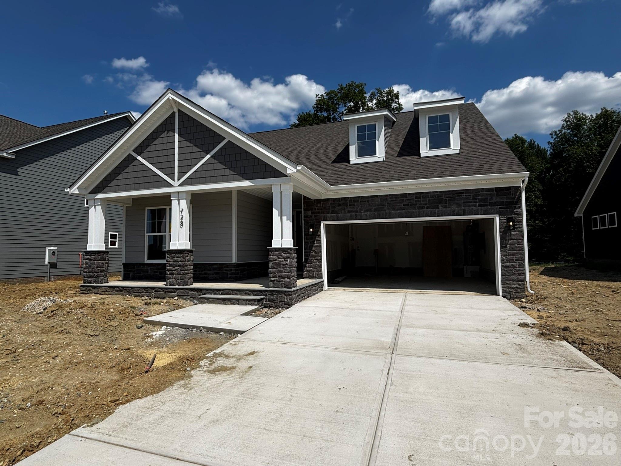 Welcome to a new construction close to Catawba River! This 1.5-story Mayfair plan offers 4 bedrooms, 3 full baths, and more than 2,500 square feet of living space. Enjoy easy main-floor living with the primary bedroom with tray ceiling & large walk-in closet, primary bathroom with luxury shower, family room with gas fireplace, breakfast area that walks out to a covered deck, and an office with French doors. The kitchen has white cabinets and white quartz counters along with a tile backsplash and stainless appliances. The main floor also includes a secondary bedroom, a full bath with 4-ft shower, mud room with a beadboard drop zone, and the laundry room. The upper floor has two bedrooms, each with a walk-in closet and access to a shared full bath, and an unfinished storage space. Other wonderful extras include a foyer with tray ceiling and upgraded trim and Enhanced Vinyl Plank flooring. Visit today and find out more!