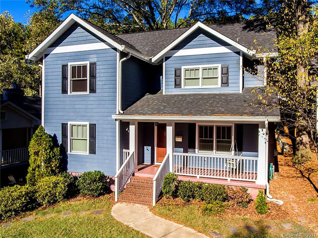 This charming home has it all!  A rocking chair front porch.  A cooks dream eat in kitchen complete with granite and induction cooktop.  A guest bedroom with full bath on the main. A large family room open to the kitchen with a beautiful fireplace.  A screened porch and backyard patio.  3 bedrooms on the 2nd floor including the master with en suite and guest full bath.  Upstairs is an office area complete with den.  Large laundry is on the second floor.  There is a walk up attic for storage.