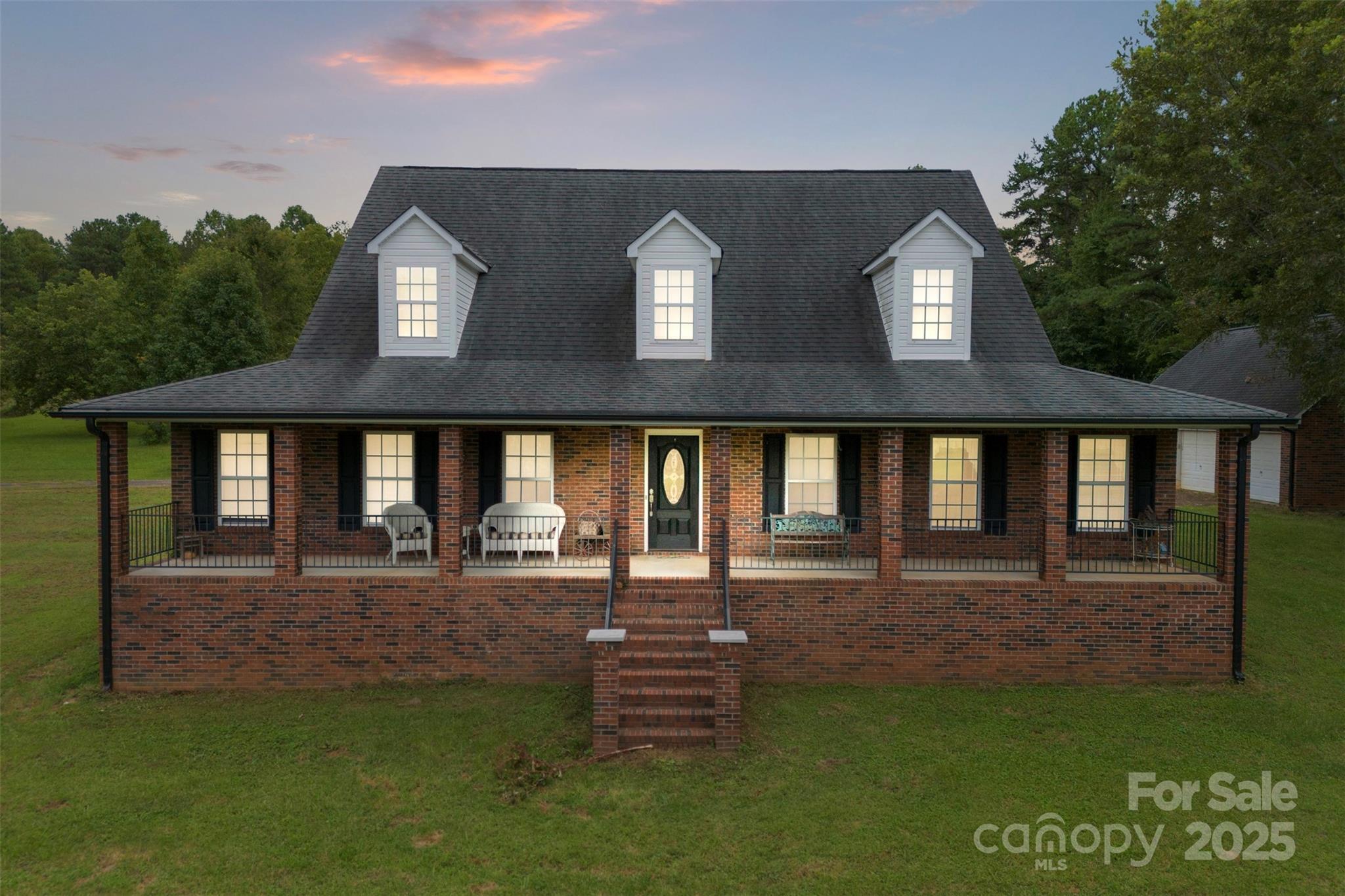 Welcome to this custom-built brick home full of country charm. Sitting on over an acre and a half with a stocked pond, this property offers plenty of space and privacy. The home features 3 bedrooms, 2.5 baths, an office, dining room, large open living room, den, and an extra flex space that could be a bedroom, playroom, or second office. With 2,719 square feet, there’s room for everyone! 

Built in 1996 by the seller’s grandfather, this home has only ever been owned by the same family and has been lovingly cared for through the years. 

Outside, you’ll find a covered front porch that stretches the length of the home, shared ownership of a private stocked pond — an ideal backdrop for fishing, relaxing, or enjoying the peaceful views. Two driveways provide easy access, and a 3-car detached garage offers plenty of storage and workspace. 

Located outside city limits! Tucked away and offering rare privacy, it’s the kind of place where you can truly enjoy peace and seclusion while still being close enough to town for convenience.  This one-of-a-kind property is ready to welcome its next chapter