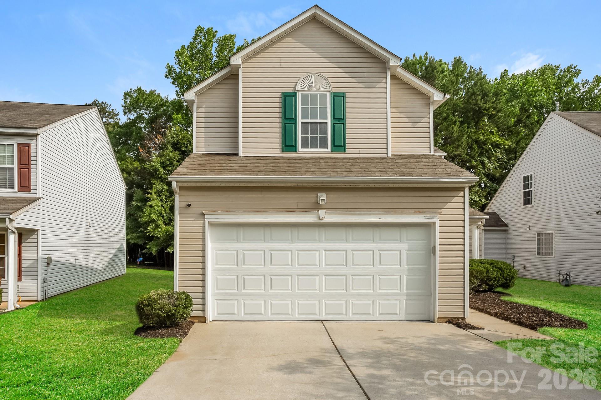 This well-maintained two-story home has been thoughtfully refreshed throughout, featuring fresh neutral paint, new carpet, and new ceiling fans in the living room and primary bedroom. The kitchen shines with refreshed cabinetry and new stainless steel appliances, while both upstairs bathrooms have been updated with resurfaced countertops and new faucets. Outside, the property is neatly landscaped with strong curb appeal all located in Charlotte's 28214 zip code, this move-in ready home offers solid value and a comfortable, stress-free living experience.