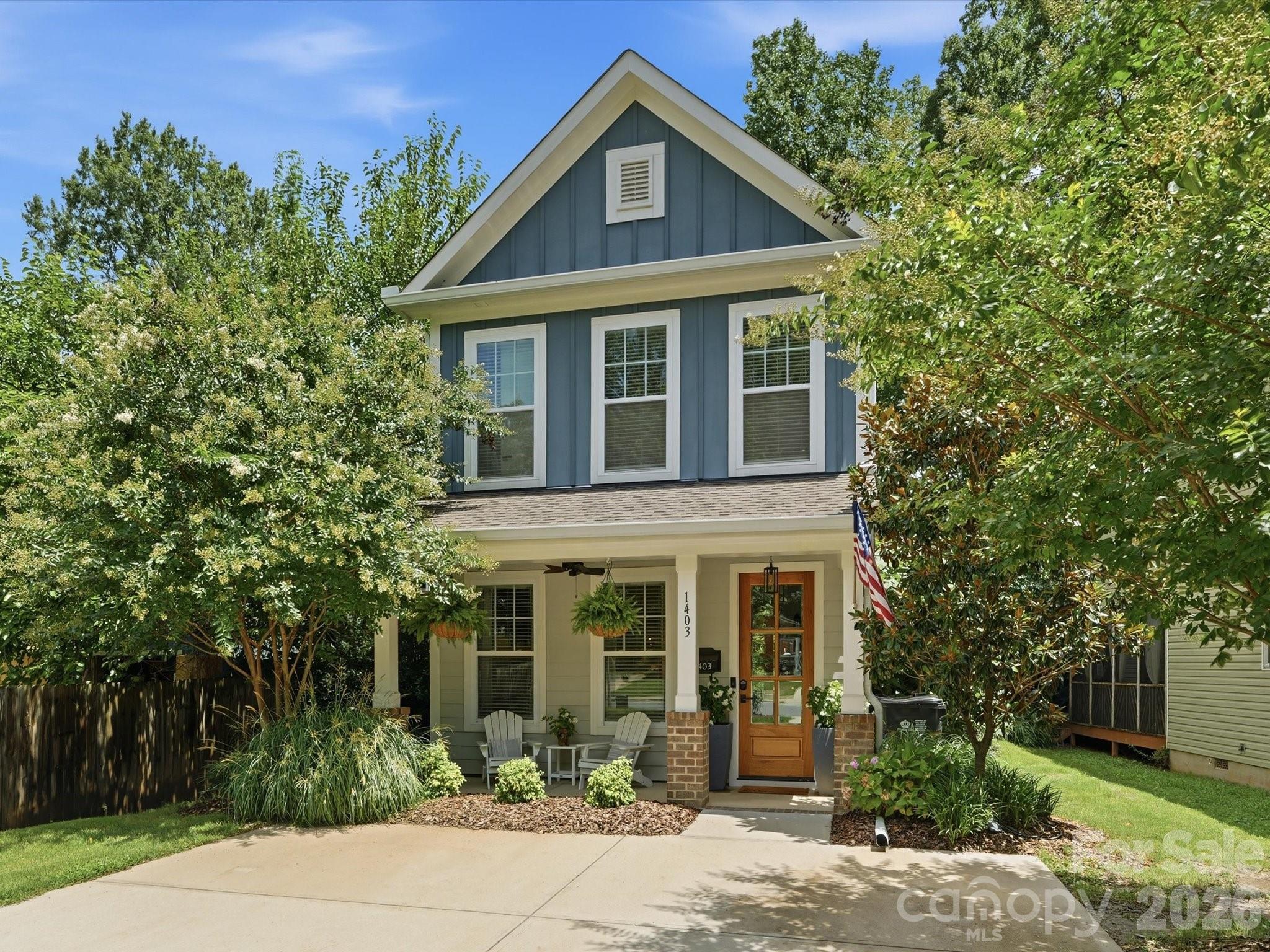 Move-in ready and better-than-new in Plaza Shamrock — the energy of the city with the calm of your own private retreat. Built in 2020, this detached home skips the headaches of older houses and attached living: no shared walls, no HOA, no deferred maintenance — nothing to fix, just move in. Inside, 1,507 square feet flow across two levels. The bright, open main floor pairs a spacious living and dining area with a sleek island kitchen, stainless appliances, and warm wood-look floors — made for easy weeknights and hosting. Upstairs: a generous primary suite with private bath and walk-in closet, two bedrooms, a full bath, and upstairs laundry. Relax on the charming covered front porch; out back, a private patio is your spot to unwind with a favorite beverage or gather friends. Plus 9' ceilings, 8' doors, and off-street parking — a rare, low-maintenance home steps from Charlotte's best dining, breweries, and greenway. City living, minus the compromises. See it before it's gone!