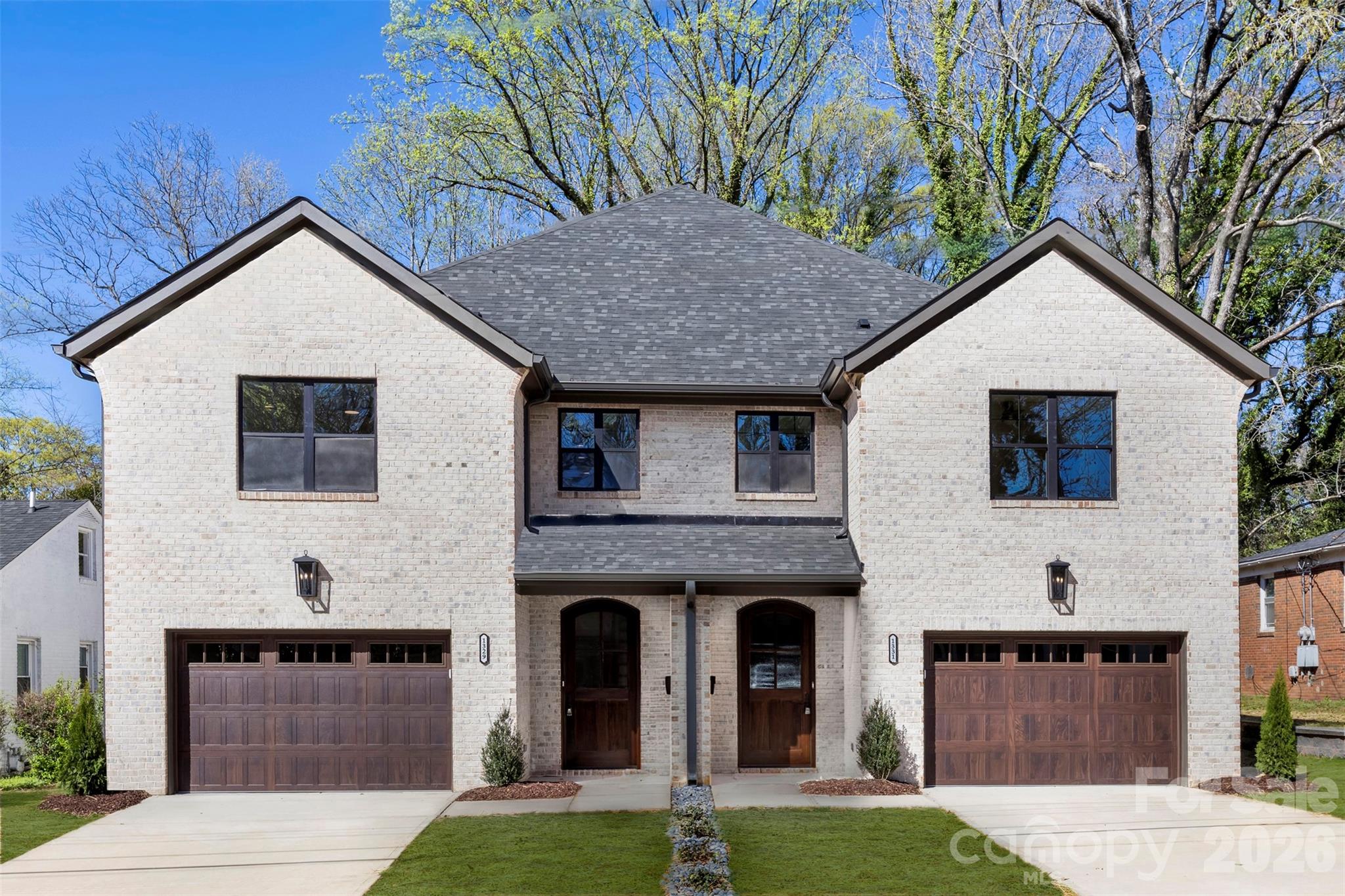 Rare opportunity to own an expansive modern home with NO HOA. This stunning brick front townhome features a spacious 2,051 sqft floor plan offering scale, privacy, and high end finishes. With 3 generous bedrooms and 2.5 baths, the home is designed for both comfortable daily living and entertaining.

The airy open concept layout is enhanced with engineered hardwood floors and crown molding throughout, flowing seamlessly to a private 12×12 patio, perfect for weekend BBQs or morning coffee. Thoughtful upgrades include a tankless water heater, EV charger outlet in the garage, and Ethernet wiring to every room for seamless connectivity. The oversized 335 SF garage, designed as a large one car space, is deep enough for two small vehicles or additional storage or workshop space.

Situated on a 0.15 acre lot, the largest townhome lot in the neighborhood, this property offers exceptional outdoor space rarely found. Conveniently located with easy access to the Uptown skyline, this home sits in a high growth corridor primed for long term value. Charlotte’s premier dining, retail, and city amenities are just a short drive away.

Don’t miss the opportunity to own a home that truly pairs close to everything convenience with room to breathe luxury.