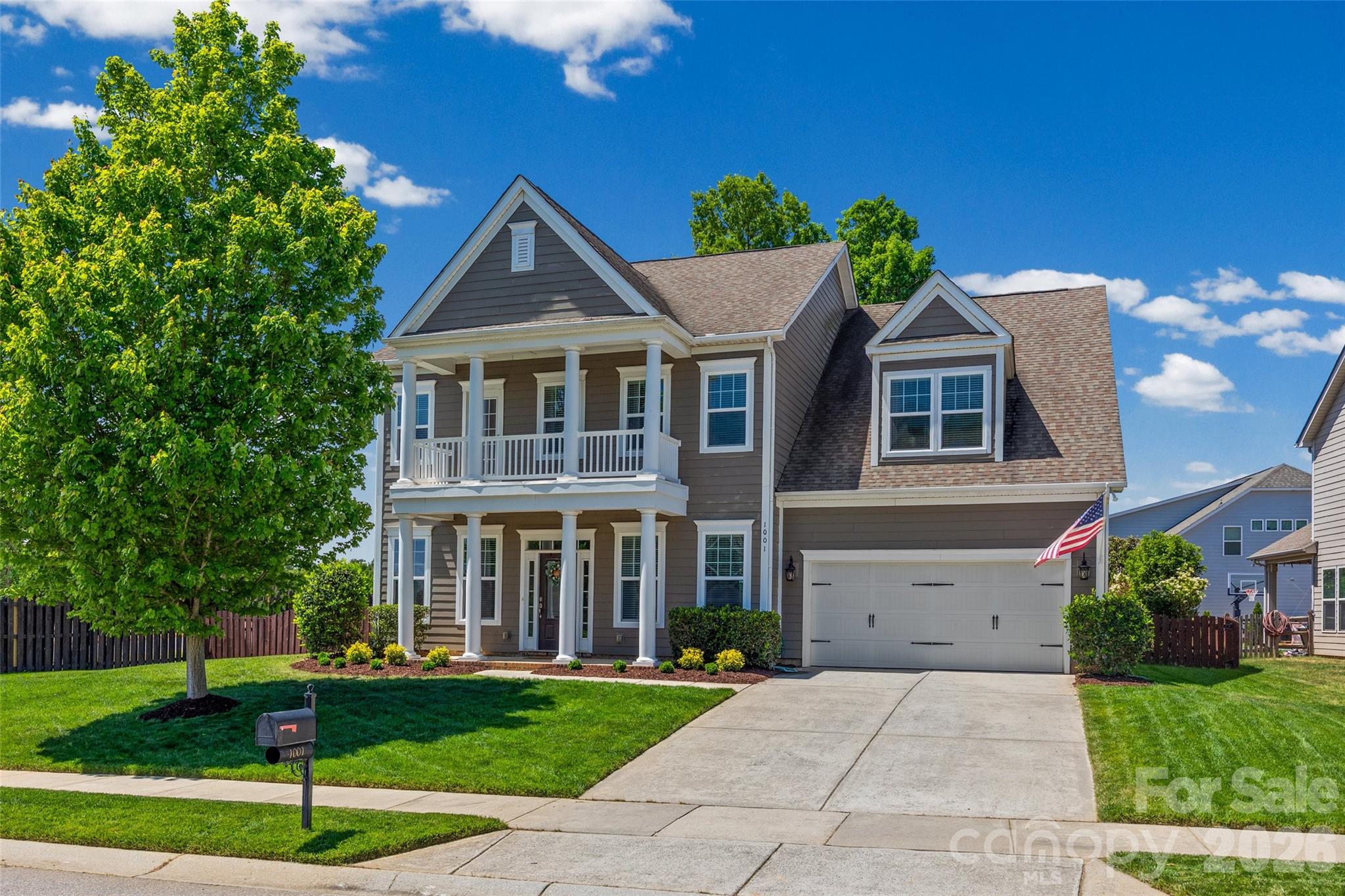 Welcome to 1001 Dunwoody Drive in the desirable community of the Enclaves at Crismark—a beautifully maintained home that blends comfort, style, and convenience.

This inviting residence offers a spacious and thoughtfully designed floor plan, perfect for both everyday living and entertaining. Step inside to find bright, open living areas, complemented by tasteful finishes and a warm, welcoming atmosphere. The kitchen is a standout feature, equipped with ample cabinetry, generous counter space, and a layout ideal for cooking and gathering. Not to mention, the surround sound system throughout the downstairs. The upstairs bonus room is also surround sound capable.

The home features multiple bedrooms with comfortable accommodations, including a well-appointed primary suite with a tray ceiling that provides a private retreat with an en-suite bath. Additional rooms offer flexibility for guests, a home office, or hobbies.

Outside, enjoy a nicely landscaped fully fenced-in yard, featuring front and back yard in-ground irrigation and a fire pit with plenty of space for relaxing, playing, or hosting outdoor gatherings.  Whether you're sipping morning coffee on the balcony or enjoying an evening with friends, the outdoor area adds to the home's appeal.

Located in a convenient Indian Trail location, this property offers easy access to shopping, dining, parks, and major commuting routes while maintaining a peaceful neighborhood feel.

Don’t miss the opportunity to make this charming property your next home—schedule your showing today!