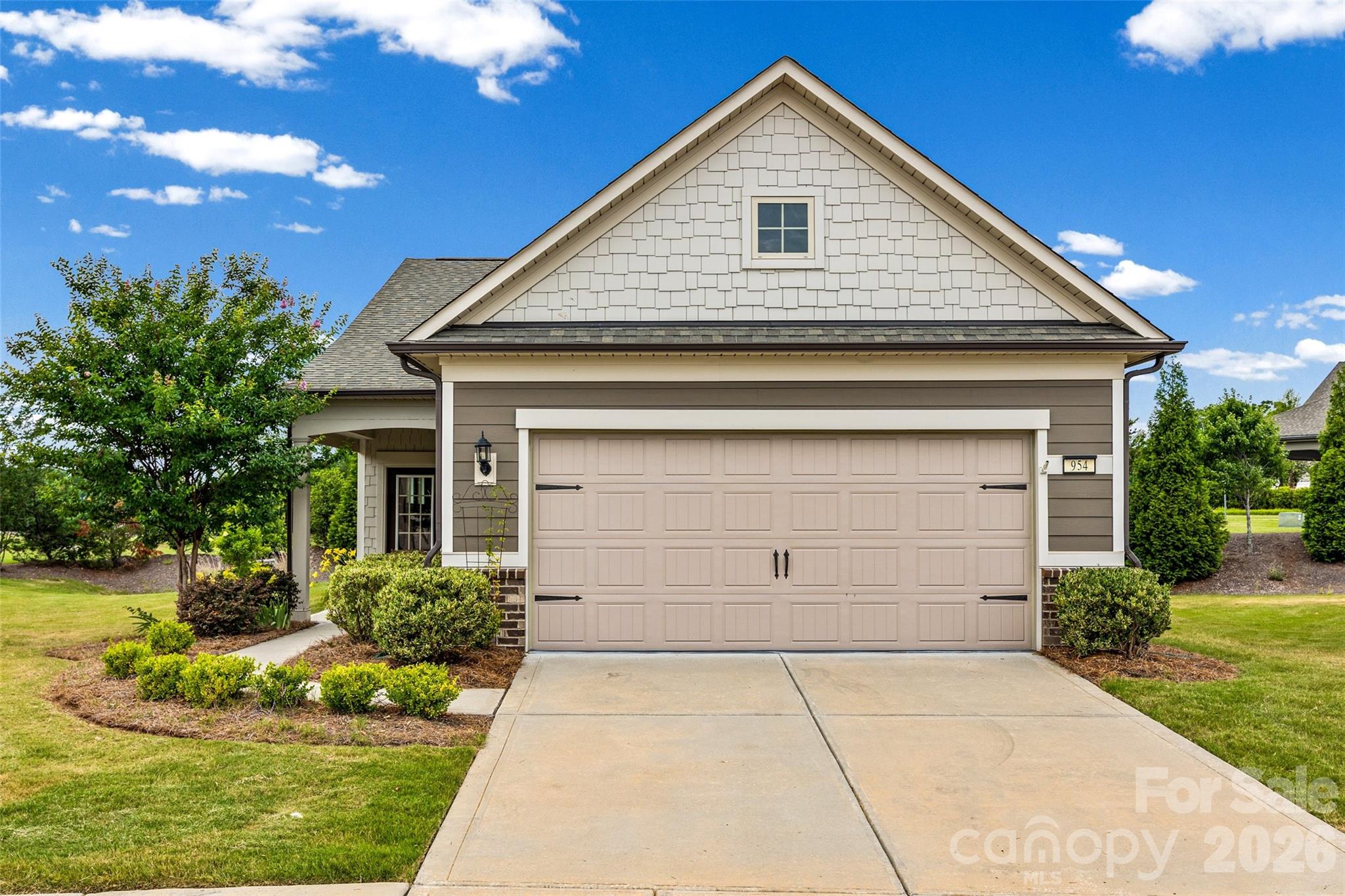 Welcome to the Award-winning Carolina Orchards 55+ neighborhood! This home has privacy and convenience all in one! Noir Coast model on a Private Cul-de-sac with common area/green space behind the property. Located a short walk from the Clubhouse and EVERYTHING that this amenity-rich neighborhood has to offer. One-level living at its finest with an open floorplan that is perfect for entertaining, yet the half-wall keeps the Kitchen separate enough to be its own space. Sunroom with an additional screened-in porch and open patio make the perfect place to unwind. The built-in china cabinet has been recessed into the wall, and will remain with the home. Full-time Lifestyle Coordinator, Fitness Center, indoor/outdoor pools & hot tubs, 8 lit pickleball cts, 4 lit tennis cts, dog park, numerous clubs & activities to choose from. Don't miss out on this opportunity to call the Carolina Orchards "Home!"