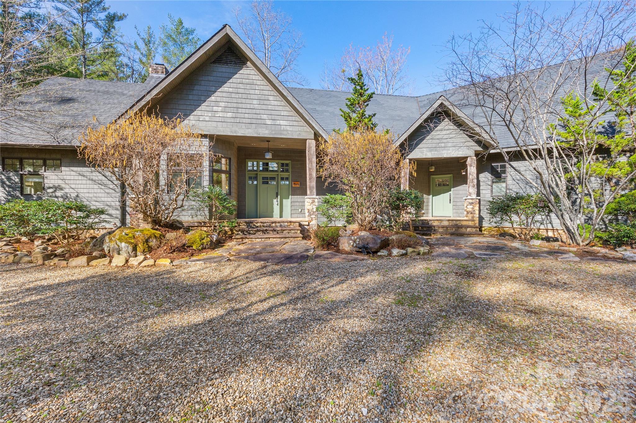 Nestled along the pristine shoreline of Lake James within the highly sought-after 1780 subdivision, this exceptional waterfront residence offers the perfect blend of luxury, comfort, and mountain-lake serenity. Featuring approximately 4,000 sq.ft. of thoughtfully designed living space, this 4BR 3.5BA home delivers refined craftsmanship and seamless indoor-outdoor living in one of Western North Carolina’s premier lake communities and is being offered turn-key(exclusions list provided), even the boat!Mature landscaping and peaceful wooded privacy create a true retreat.The main living area is anchored by a spacious great room with reclaimed barn oak and antique wormy chestnut, featuring soaring ceilings, refined architectural details, and a fireplace that serves as a natural gathering place for family and guests alike.The flowing floor plan connects the living room, dining area, and kitchen, making the home ideal for both everyday living and entertaining.The chef’s kitchen is designed to impress with dual dishwashers, a Sub-Zero wine cooler, a beautiful radiant AGA stove built in England and custom cabinetry throughout.Thoughtful storage and functional design make this kitchen equally suited for preparing holiday meals or relaxed lake-day meals.The primary suite serves as a private sanctuary to provide a tranquil escape at day’s end. The bedroom offers direct access to outdoor living areas, while the en-suite bath features dual vanities and a walk-in shower.Additional main-level living areas provide flexibility for a home office, reading room, or secondary gathering space, allowing the home to adapt to a variety of lifestyles.The home comfortably accommodates family and visitors alike.Guest rooms are thoughtfully positioned to offer privacy and comfort with a separate entrance, making extended stays enjoyable for everyone.The lower level expands the home’s entertainment possibilities with a large recreation or family room ideal for movie nights, game days, or relaxed evenings after a day on the lake.This level provides easy access to outdoor living spaces and the waterfront, enhancing the home’s connection to the lake lifestyle.Expansive decking with custom railings curated by Oak Hill Iron, a sunken hot tub on the main level and a large covered porch create ideal settings for morning coffee, sunset dinners, or gathering with friends after a day on the water.A brand-new covered dock anchors the waterfront experience, providing convenient and stylish access to boating, swimming, paddleboarding, and all that Lake James has to offer.Whether launching a morning cruise or enjoying quiet evenings by the shoreline, the dock becomes a centerpiece of daily life.The gently sloping lot enhances accessibility to the waterfront while preserving privacy and natural beauty.Ownership in 1780 includes membership to Camp Lake James, a highly desirable private amenity center that elevates the lake lifestyle beyond the waterfront itself. Designed as a gathering place for residents, Camp Lake James offers resort-style amenities and year-round social opportunities. Residents enjoy access to an Olympic-size swimming pool, relaxing hot tub, and beautifully maintained pickleball courts, creating spaces for both recreation and connection.The welcoming social hall serves as the heart of the community, complete with a canteen and dining areas ideal for casual meals, events, and neighborhood gatherings. Whether spending afternoons poolside, enjoying friendly competition on the courts, or attending community events, Camp Lake James adds an exceptional layer of convenience and lifestyle appeal.Nearby attractions include Lake James State Park, hiking and biking trails, local breweries, and charming mountain towns offering dining, shopping, and cultural experiences. Whether envisioned as a full-time residence or a mountain-lake retreat, the home offers an exceptional lifestyle defined by natural beauty, comfort, and connection to both lake and community.