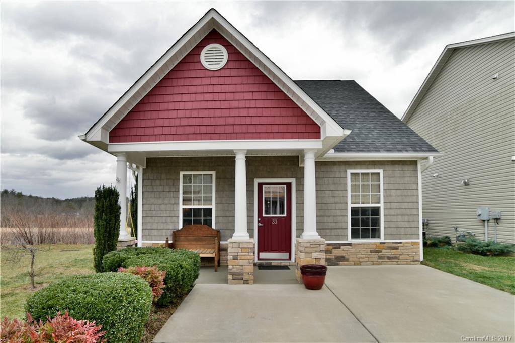 Well kept home in convenient Arden location. Easily converted to a 3 bedroom. Cozy living room with gas log fireplace open floorplan to light kitchen and dining area with master on second floor. Home bordered in the rear by large fields adjacent to the French Broad River with mountain views. This delightful community features hiking trails as well as a pool. Level yard for your own landscaping touches.  Priced to sell.
