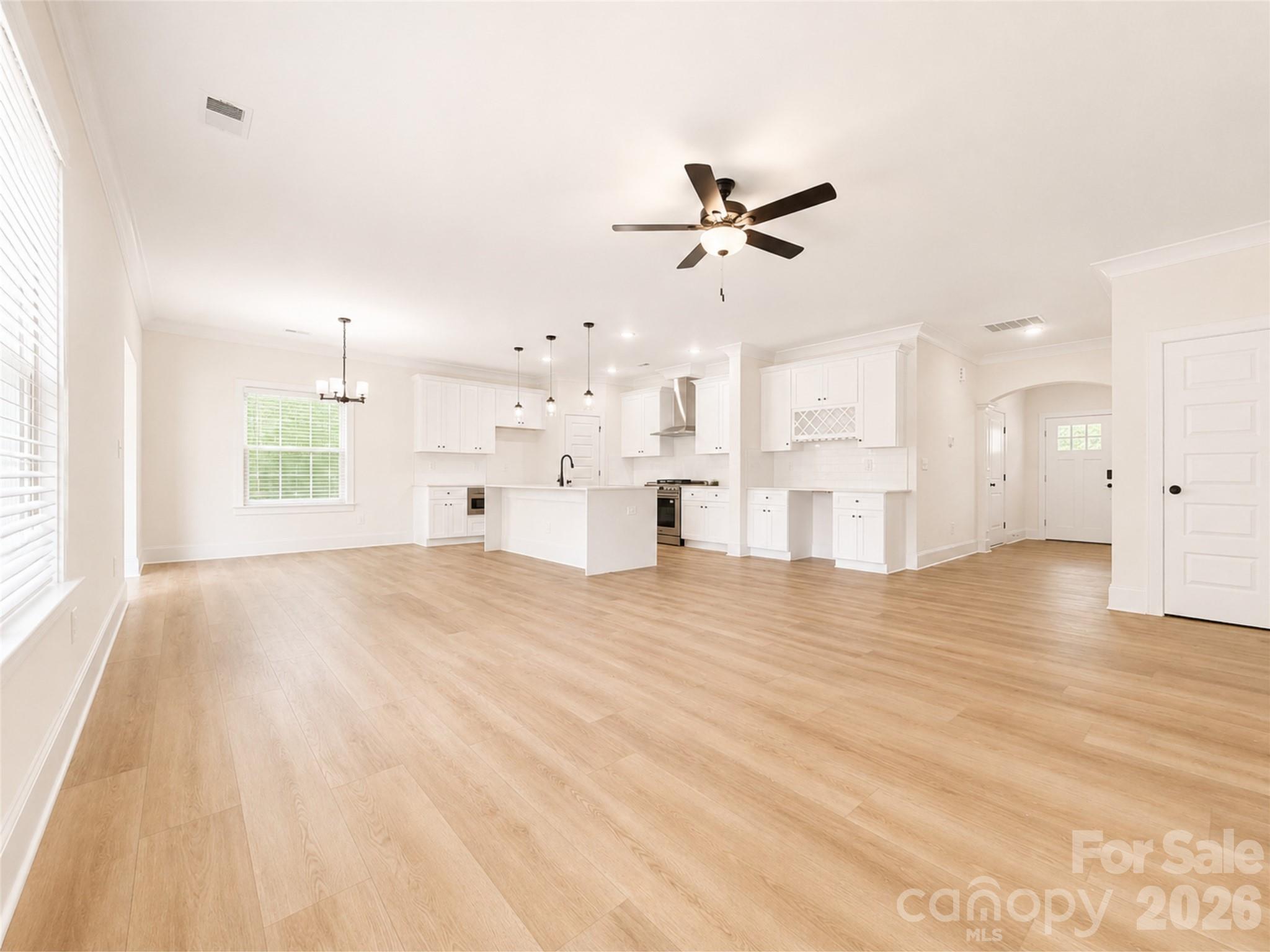 EXTRA LARGE BACKYARDS!! Complete and Move in Ready! Walk to Cotswold Village for shopping and dining. Fully fence your large backyard and enjoy endless possibilities for outdoor living.

Located in the highly desirable Cotswold area of Charlotte with sought-after schools, this beautifully appointed duet-style home offers the space and feel of a single-family residence without the single-family price tag—and NO HOA dues.

Built by SouthCraft by EMPIRE HOMES, this thoughtfully designed home features an open-concept layout with 9' ceilings on both floors, wide-plank flooring, elegant molding, and abundant natural light. The chef-inspired kitchen showcases a stunning waterfall Carrara quartz island, 42" soft-close cabinetry, gas range, microwave drawer, designer hood, custom wood-shelved pantry, and an extended beverage bar.

The spacious sunroom opens to a large deck with a gas stub, perfect for grilling and entertaining. Upstairs, generously sized bedrooms provide privacy and comfort, while the primary suite features a custom wood-shelved closet system.

Additional highlights include a tankless water heater, architectural shingles, Low-E windows, and premium finishes throughout.

Outside, the deep, level backyard offers the perfect canvas for a future pool, outdoor entertaining area, lush landscaping, or private retreat.

Luxury finishes, modern functionality, exceptional value, and one of Charlotte's most sought-after locations—this home truly has it all.



Property lines shown in photos are approximate. Interior photos are virtually staged.