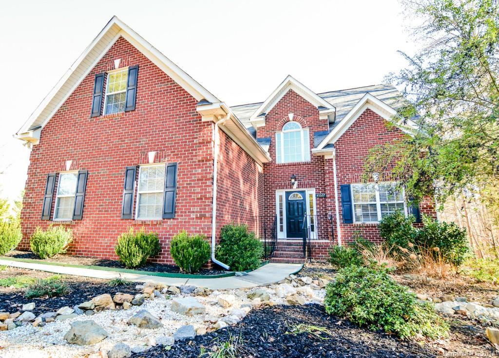 Motivated Seller. Waterfront living, beautiful brick home in N Lancaster.  Only minutes to HWY 521 makes for an easy commute to Charlotte, Columbia & Rock Hill! Features 3 B/2.5 BA, Lg master on main, formal dining room, entry foyer, spacious family room with cathedral ceiling, gas fireplace, upstairs features two addtl bedrooms, bonus room and loft area.  Large backyard with fire pit that overlooks neighborhood lake, trees surround both sides of home for privacy. Large deck for entertaining!