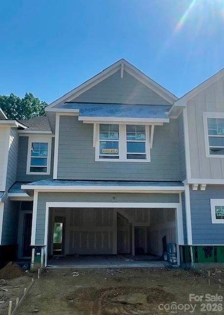 Discover the ease of luxury low-maintenance living in this brand-new Mecklenburg II townhome, conveniently located just minutes from Ballantyne, Waverly, and the charming shops and restaurants of historic downtown Waxhaw. Filled with natural light, the open-concept living area is highlighted by three large picture windows overlooking a private wooded backyard. The designer kitchen features 42” White colored soft-close cabinetry, sleek quartz countertops, a spacious shiplap wrapped island open to the family room, Frigidaire stainless steel appliances, an exterior-vented range hood, and a pantry with solid shelving. The main level showcases durable LVP flooring throughout, along with composite stair treads leading to the second floor. Upstairs there is a loft area with LVP flooring, unwind in the luxurious Owner’s Retreat featuring a tray ceiling, oversized walk-in closet, and three large windows that create a bright, airy feel. The spa-inspired primary bath offers tiled flooring, a large tiled walk-in shower with bench seating, oversized dual vanity with quartz countertops and soft-close cabinetry, a linen closet, and a private water closet. The second floor also includes two spacious secondary bedrooms, a full hall bath, and a thoughtfully designed laundry room with tiled flooring and a convenient folding table. Enjoy peaceful mornings or relaxing evenings on the covered porch overlooking the wooded nature preserve. A side-by-side two-car garage and full driveway provide ample parking for both homeowners and guests. With low taxes, low-maintenance living, and the feel of a single-family home, this townhome offers the perfect blend of comfort, convenience, and style. Ask about special low-interest rate opportunities!