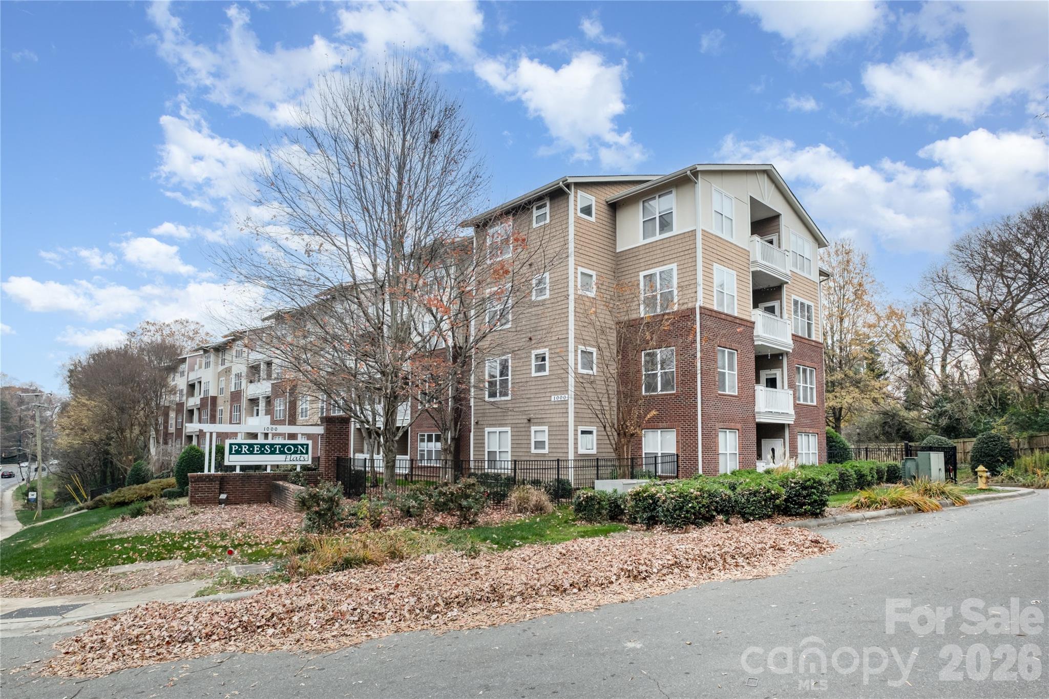 Excellent opportunity in Preston Flats! This move in ready home features the perfect floor plan, welcoming you with a wide open kitchen and living space. Two large bedrooms on opposite sides of the unit, BOTH with a full en suite bathroom! Don't miss your own private balcony off the living room for morning coffee or an evening drink. This community features a large outdoor pool, gated entry, and covered parking. You can't beat the location, just a quick drive all that SouthPark, Montford, LoSo, and Southend have to offer -- schedule your tour today!