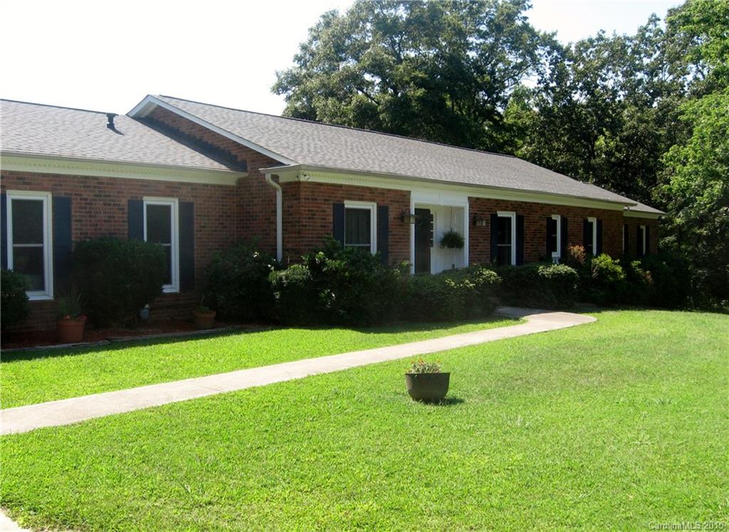 Who knew you could find your piece of the country just minutes from Ballantyne? 6 beautiful acres with a pond to fish in, plus another one at the rear of the lot. Relax by the pool, or play and garden in the huge yard. Perfect for multi generational living.  Spacious living areas and two owner's bedrooms.  Lots of parking for entertaining or family.  Room for your horses.  New roof, pool pump and HVAC.  Bring your creativity to update to your taste and you will have a truly amazing home!