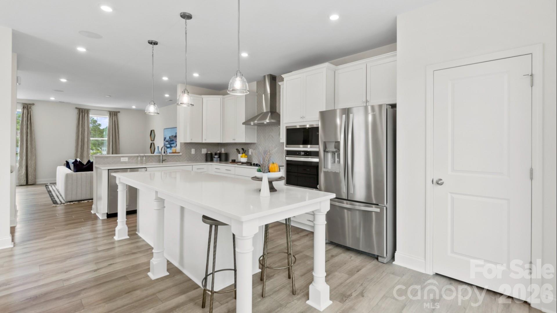 The Landon Plan at Greenway Overlook — the only 4-bedroom opportunity with a bedroom and full bath on the main floor! Open-concept on second floor with a generous kitchen island, deck off the kitchen, and bedrooms located on the third floor. Ideal for modern living. A truly rare opportunity!

Greenway Overlook offers quick access to South End, NoDa, shopping, dining, parks, greenways, major highways, and Charlotte Douglas International Airport. HOA services cover water, sewer, trash removal, lawn care, and landscaping, supporting a low-maintenance lifestyle in a central Charlotte location.

This home is under construction and scheduled to be completed in the beginning of summer of 2026! Let buyers take advantage of the opportunity to plan ahead and secure new construction at today’s pricing.

Homesite #12