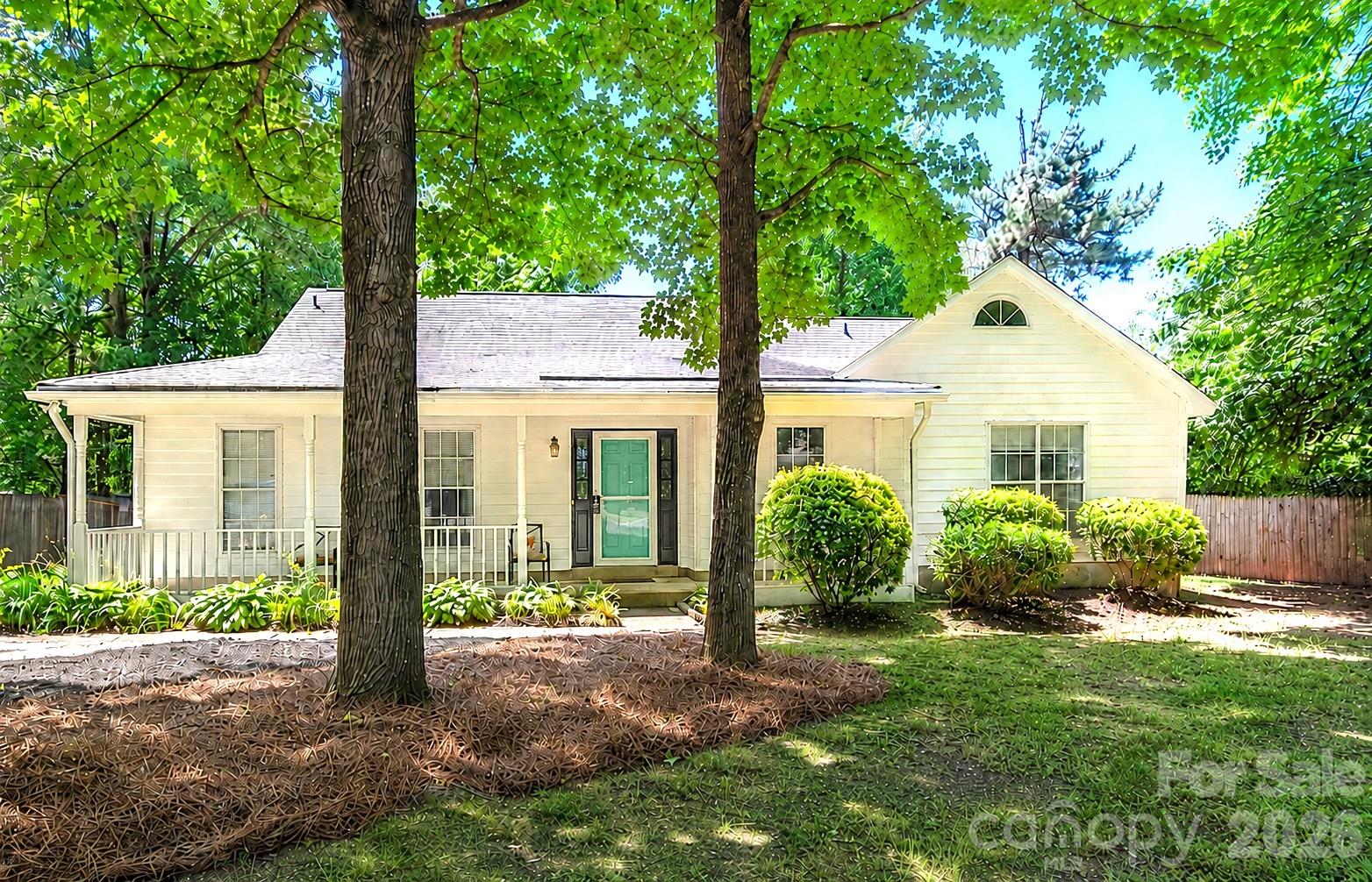 Nestled on a private cul-de-sac, this charming one-level ranch with freshly painted exterior offers over 1,700 square feet of comfortable living space on a spacious quarter-acre lot with no HOA fees. Relax on the welcoming front porch shaded by mature trees or enjoy the large, flat backyard with electricity already run for a future workshop or shed. Inside, you'll find new flooring, updated bathrooms, a spacious great room with vaulted ceilings and a cozy wood-burning fireplace, plus both a formal dining room and an eat-in kitchen. A versatile flex room off the rear of the home provides endless possibilities as a sunroom, office, playroom, or sitting area. The primary suite features a private en-suite bath and an oversized walk-in closet. Additional features include an exterior storage closet (approximately 62 square feet), a roof approximately 9 years old, HVAC replaced 3 years ago, and water heater approximately 6 years old. Conveniently located just minutes from all that Ballantyne has to offer, including The Bowl at Ballantyne, shopping, dining, and entertainment. Carolina Place Mall is just down the road, with Uptown Charlotte, South End, and Charlotte Douglas International Airport all within a short drive.