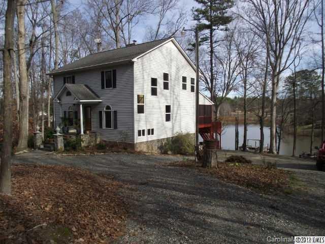 Gorgeous waterfront home 3BR/3BA. Finished and carpeted/tile basement. 2 Fireplaces, oversized master with windows for spectacular view. Floating dock with boat lift, stone patio, granite countertops, hardwoods and tile on main. Huge windows for natural light, screened porch, rear deck, private cove. Proof of Renters Insurance is Required.