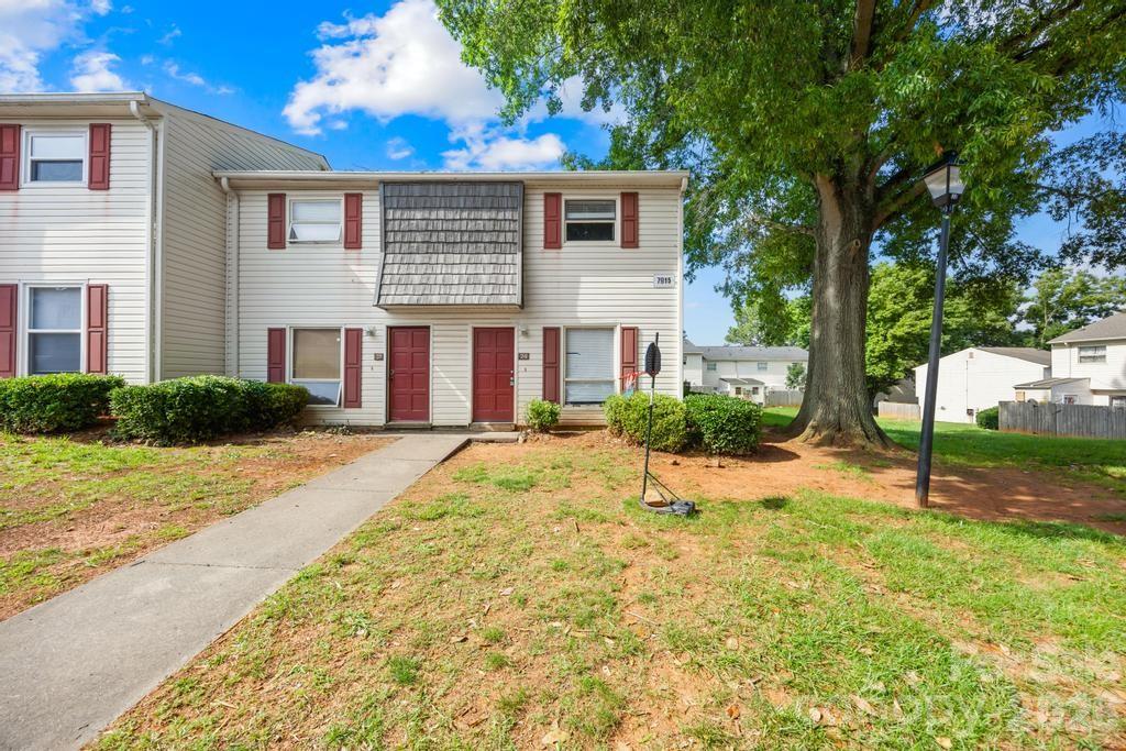 Set in Quail Run, this end-unit 2BR/2.5BA condo offers an easy two-story layout with comfortable living space, updated vinyl plank flooring, and a main level designed for everyday function. The entry opens to a spacious living room that flows into the dining area and kitchen, where white cabinetry, electric range, dishwasher, microwave, pantry storage, and a nearby laundry room keep things practical. A main-level powder room adds convenience, while both bedrooms are tucked upstairs with two full baths for added separation. Out back, enjoy a fenced private patio with utility/storage space, plus lawn maintenance and in-ground irrigation. A smart opportunity in Charlotte with 1,060 heated sq. ft. and a layout that lives simply and efficiently.