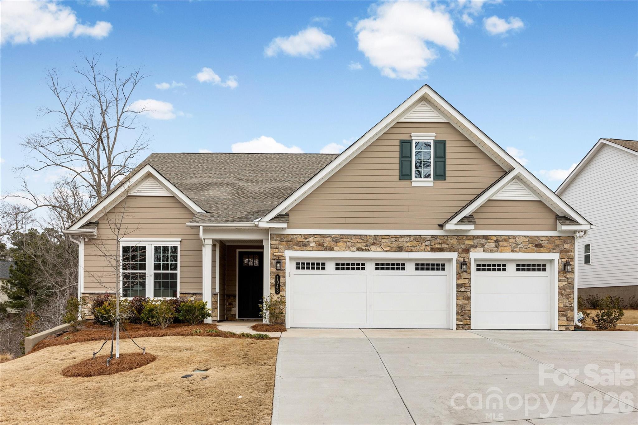 New Construction | Former Model Home – Fully Furnished! Step into this show-stopping former model, beautifully appointed and move-in ready, located in one of the area’s most sought-after active adult communities. Offering 3 bedrooms, 3 bathrooms, and a 3-car garage, this home is designed for effortless luxury and everyday comfort. Soaring ceilings, extensive custom trim, and designer finishes set the tone, while the gourmet kitchen is a true centerpiece—perfect for entertaining or everyday living. The owner’s suite is a spa-like retreat featuring a dreamy walk-in shower, and the private guest suite with its own en-suite bath. Unwind while taking in peaceful wooded views from the overlook deck, or relax on the expansive covered and screened porch—perfect for morning coffee, sunset dinners, or quiet evenings at home. The oversized three-car garage offers generous space for vehicles, storage, and hobbies, and the golf-cart-friendly neighborhood makes getting around a breeze. 
Residents of The Gentry at Handsmill enjoy a vibrant active adult lifestyle along with exceptional resort-style amenities, including a beautiful clubhouse, pool, fitness center, private RV and boat storage, wet slips, and a boat ramp. The marina and dry storage leases are available first come first serve.  This fully furnished, move-in-ready home blends luxury, convenience, and lifestyle—everything you need to begin your next best chapter.