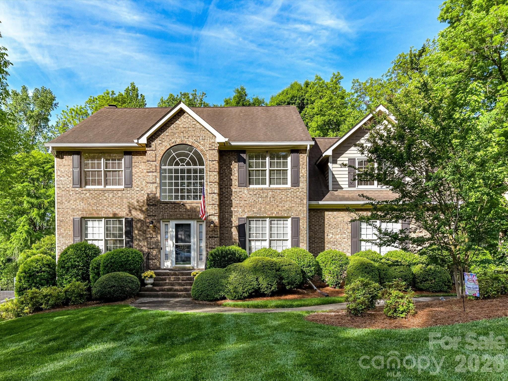 Experience refined living in this impeccably maintained, one owner residence. Gracefully positioned on a premium  lot in one of the area’s most sought after locations, just moments from an array of shopping and dining options. Offering 4 bedrooms and a partially finished basement, this home is a seamless blend of elegance, comfort, and enduring quality. From the moment you enter the main level you will see that it showcases an effortless flow, with the family room opening beautifully into the breakfast area and kitchen. Anchored by a fireplace and custom built-ins, the family room exudes warmth and timeless charm, while 5-inch wood flooring spans much of the main level, adding richness  to each room. The kitchen is both stylish and functional, featuring granite countertops, a gas range, and a sunlit window over the sink, perfectly framing the heart of the home. Formal living and dining rooms provide an elegant setting for hosting and memorable gatherings. The primary suite is a true retreat, complete with a private sitting area, an expansive walk-in closet, and a spa-inspired bath offering dual sinks with granite counters, a walk-in tiled shower, and a luxurious jacuzzi tub designed for relaxation. The basement presents endless possibilities with its own outside entrance. The original build plans allowed for an inside entrance to the basement in place of the coat closet under the stairs.  The basement is ideal for a private lounge, studio, or workshop tailored to your lifestyle with 773sf of HLA. Step outside to a serene screened porch and spacious deck, an inviting extension of the home, perfect for morning coffee or evening unwinding in a peaceful, natural setting. The meticulously maintained grounds are enhanced by a full irrigation system, completing this exceptional outdoor experience. Don't miss out on this fantastic home and location.