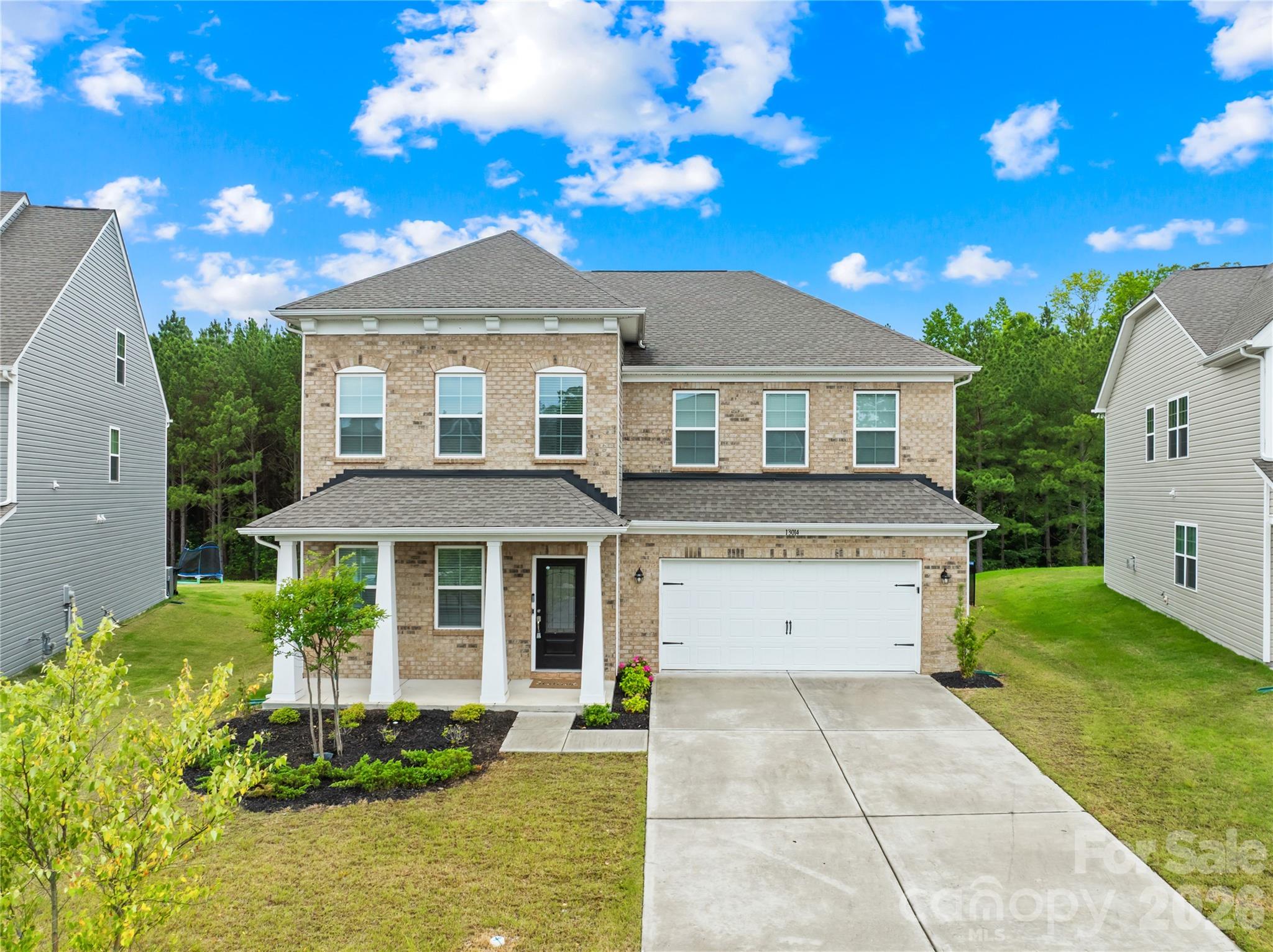 Welcome to this beautifully maintained, like-new home in the highly desirable Chateau community! Offering 5 bedrooms, 4.5 bathrooms, and over 3,437 square feet of thoughtfully designed living space, this home combines modern style, functionality, and comfort in a prime Charlotte location.

Step inside to find a private home office with French glass doors, perfect for working from home, along with a main-level guest suite featuring its own full bathroom, ideal for visitors or multi-generational living. The open-concept floor plan is centered around a spacious great room and a stunning kitchen complete with granite countertops, tile backsplash, gray cabinetry, gas range, pantry, and a bright breakfast area. A formal dining room, convenient powder room, and seamless access to the backyard make this home perfect for both everyday living and entertaining.

Enjoy the privacy and tranquility of the fully fenced backyard backing to mature woods, creating a peaceful setting for relaxing, entertaining, pets, and outdoor enjoyment.

Upstairs, a massive loft provides flexible space for a second living area, media room, playroom, or home gym. The expansive primary suite features a spa-inspired bathroom and an oversized walk-in closet. Two secondary bedrooms are connected by a convenient Jack-and-Jill bathroom, while another bedroom enjoys access to an additional full bath, providing comfort and privacy for family and guests alike. A spacious laundry room completes the second floor.

Residents of Chateau enjoy resort-style amenities including a clubhouse, swimming pool, playground, and tennis courts. Conveniently located just minutes from Rivergate Shopping Center, Carowinds, dining, shopping, and major highways, with Charlotte Premium Outlets approximately 15 minutes away and Charlotte Douglas International Airport within a 30-minute drive.

This move-in-ready home offers the space, layout, privacy, and location today's buyers are looking for. Schedule your private tour today!