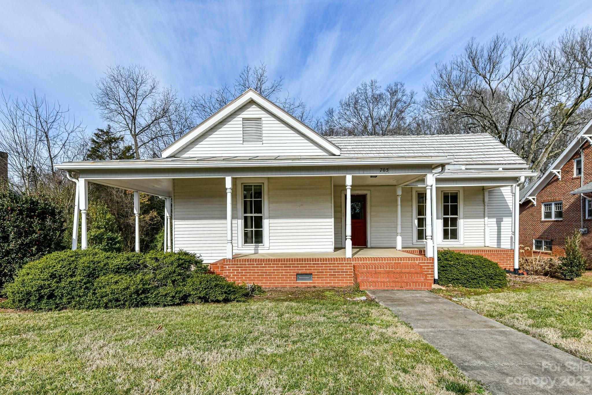 Extremely rare opportunity to own a .634 acre parcel on N Main Street in Davidson! One block from the main entrance to Davidson College,this property has great potential for the buyer who wants to revovate a lovely home. One story, 3 BR/ 2 Bath home was built in 1900. House has many beautiful features. The property is being sold AS IS & it is located in an Historic District of the Davidson VIP Zoning Area. Property features a large, well-maintained gravel driveway/parking area. Has a tall walk-in crawl space which could be turned into a heated basement. Large, private rear yard w/ so many options. Large front porch. The rear .13 acres of the parcel is located in the N-S Railway easement. Please see the Historic District attachment which explains the Town's process for renovation   Per VIP guidelines the property qualifies for up to 4400 +/- of heated square footage (excluding basement & detached garage). There is ample room for a detached garage/apt.