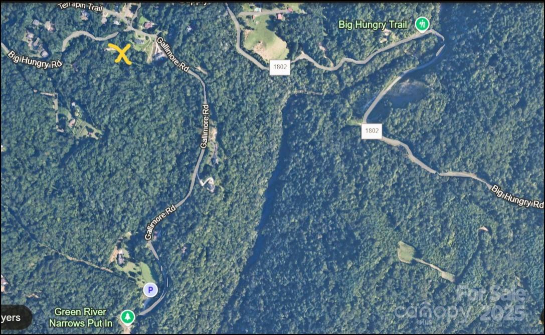 Perfect harmony - adventure & tranquility, rare opportunity near Big Hungry Trails & iconic Green River Narrows launch point. Tucked away in nature yet just mins from H'ville & major interstates, stunning & the ultimate blend of privacy, & endless outdoor possibilities. Envision... cozy cabin, MTN-modern retreat, or family compound, this land delivers—w/multiple buildable homesites, 450+/- ft of rd frontage. Picture waking up to the sound of a creek flowing & sipping coffee or while the sun sets &  hiking, biking, & exploring the best of Western North Carolina. More than land—it’s a lifestyle. Unplug, unwind, & build your vision in a place where beauty & serenity surround you. Call/text today to walk property & make this dream yours! (Be sure to check R3 zoning & permitting to confirm it fits your intended use. Addl. MLS #s available—ask for details!) Price reflects the state after hurricane. THIS IS A Portion of a larger parcel- buyer is responsible for survey, acreage may vary.)