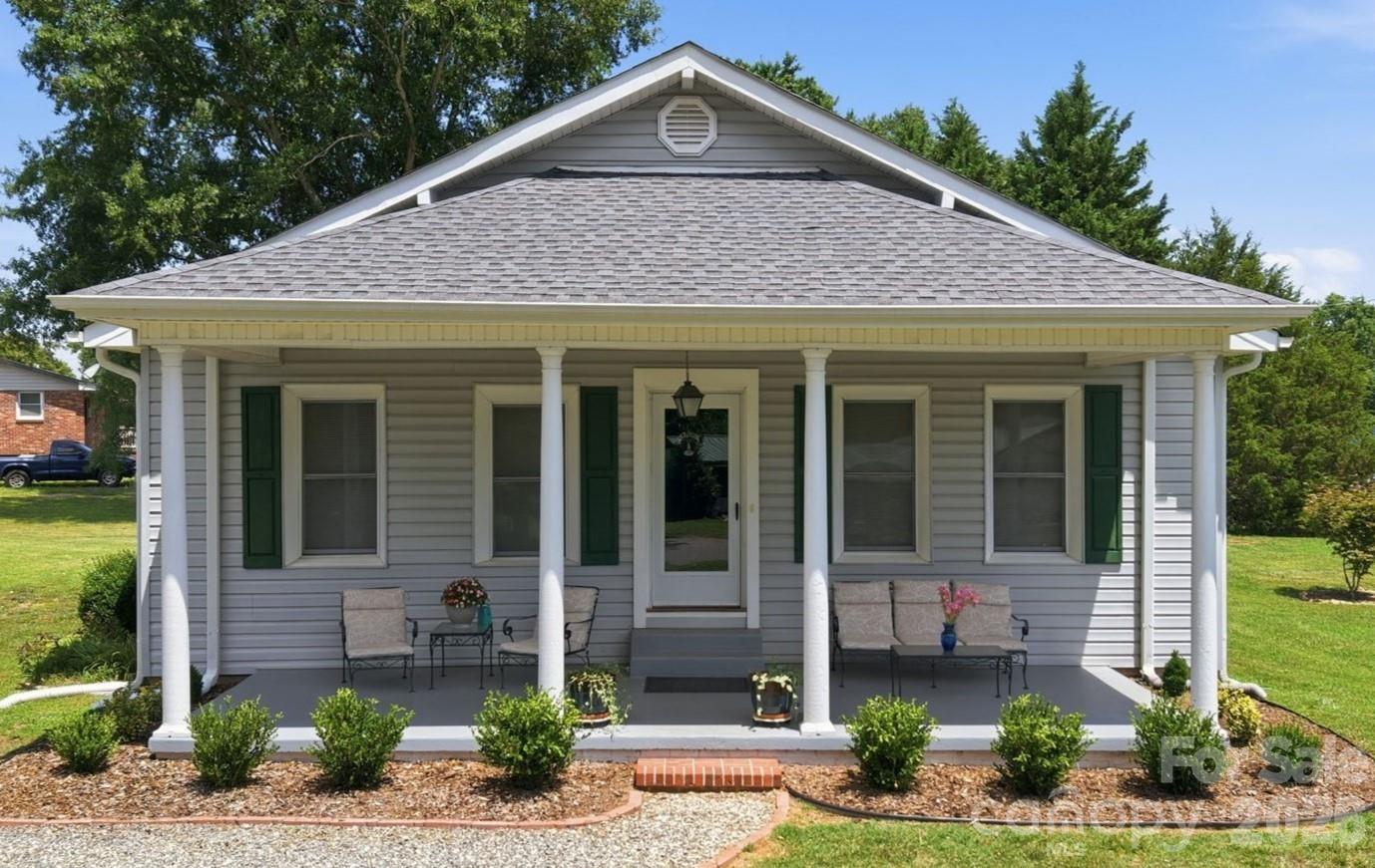 Located in a quiet neighborhood full of timeless charm, this adorable 3-bedroom 1-bath cottage, surrounded by a perfectly manicured flat half acre, is beautifully maintained and move-in ready. Features include 9-foot wood ceilings, heart of pine throughout, and pristine original 1946 hardwood floors. Three gas fireplaces add warmth and character, while the functional kitchen is designed for everyday living. Enjoy the covered back deck overlooking the beautifully maintained yard, plus the convenience of a two-car carport and two well-maintained storage sheds that convey. Charming curb appeal and classic details make this a home you'll fall in love with from the moment you arrive.
New Roof 2025, HVAC replaced in 2022, Pre-paid maintenance services included for HVAC, Gas, Pests and more. 
Backup generator powers the sump pump only.