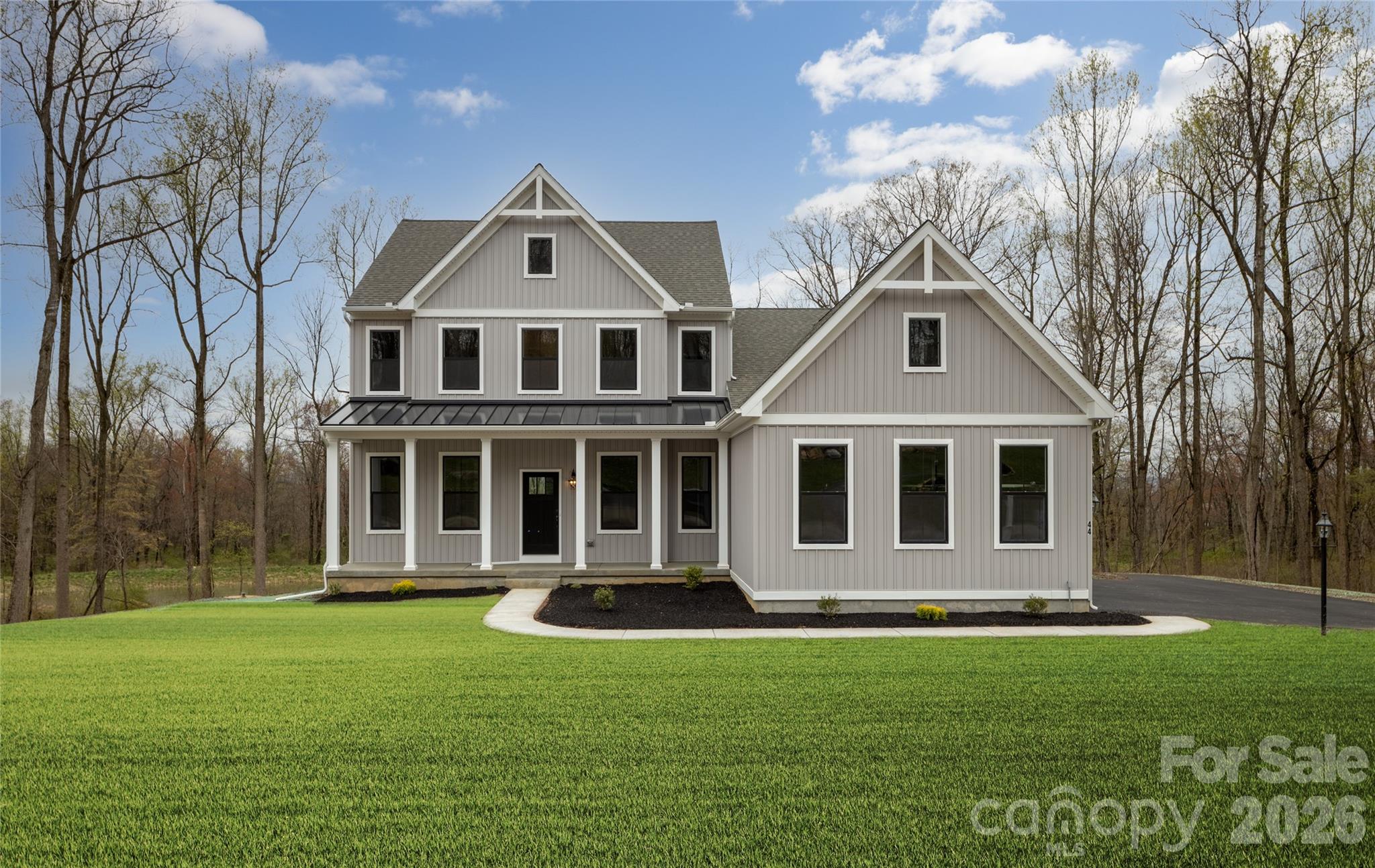 Welcome to The Gables at Handsmill Inland, where you can enjoy the beauty of Lake Wylie without the upkeep of a waterfront property. Choose from 3 water-view and 5 off-water homesites, each designed with a walkout basement for added space and flexibility. Select homesites are tucked at the end of a row or on a cul-de-sac, providing an extra sense of privacy. Take in breathtaking sunsets over the lake and enjoy easy access to all the perks of lakeside living.

The Augusta features an open floorplan and first-floor Owner’s Suite. An eat-in Kitchen and Breakfast Area are open to the Family Room. The Owner’s Suite has a full bath and large walk-in closet. A Study and formal Dining Room are off the front Foyer. The Laundry Room leads to a 2-car Garage. A Loft Area, full bath, and 3 additional bedrooms with walk-in closets are located upstairs. The Augusta can be customized to include up to 5 Bedrooms and 3.5 Bathrooms. 

See also: 4297009 & 4297000