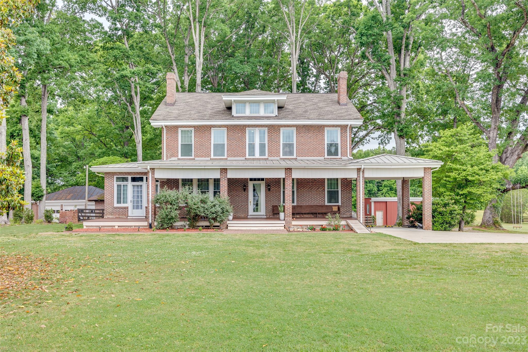 Talk about Southern Charm, this unique and beautiful home is 98 years old. Only four families have gotten to be her caretaker. She sits on just under 4 acres of land next to several other beautiful homes. Her front porch is what every Southerner dreams of. The details inside are just as stunning: 10 foot ceilings, stunning hardwoods throughout, exposed brick walls, a fireplace in every room, original doors and glass door knobs. Bathrooms and kitchen have been remodeled over the years. In the past 6 years she’s gotten a new roof, new HVAC and duct work, new windows, tankless hot water heater. A garage shop with electricity sits behind the home as well as the original generator house that serviced this one and the next door neighbor. This house is rich with history and details.