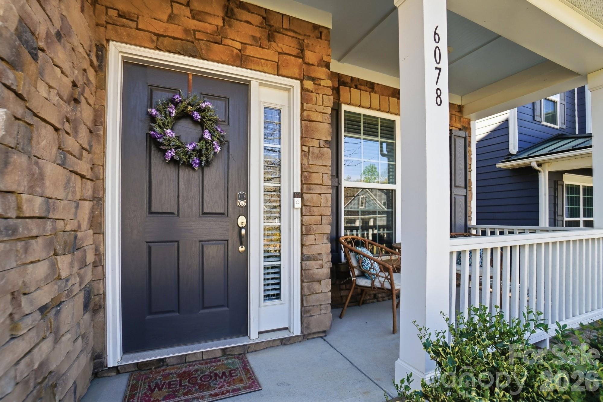 Welcome to Cameron Creek in desirable Tega Cay! Step into this beautifully designed 3-bedroom, 2.5-bath home featuring an open-concept layout that’s perfect for both everyday living and entertaining. A dedicated main-floor office with French doors, elegant moldings, and fresh neutral paint throughout adds both charm and functionality.
The gourmet kitchen is a standout, complete with a large island, stainless steel appliances, tile backsplash, walk-in pantry, and e-zone workspace—all seamlessly opening to the living and dining areas. A versatile flex room offers endless possibilities, whether you need a home gym, playroom, or additional office space. Upstairs, spacious bedrooms provide comfort and ample storage, while additional storage areas on both levels make organization effortless. Hardwood flooring runs throughout the main living areas, adding warmth and style. Enjoy the home’s stone-accented exterior and inviting front porch—perfect for relaxing evenings. A rear-load 2-car garage adds convenience, and the community offers fantastic amenities including a pool and playground, all just minutes from shopping and dining.