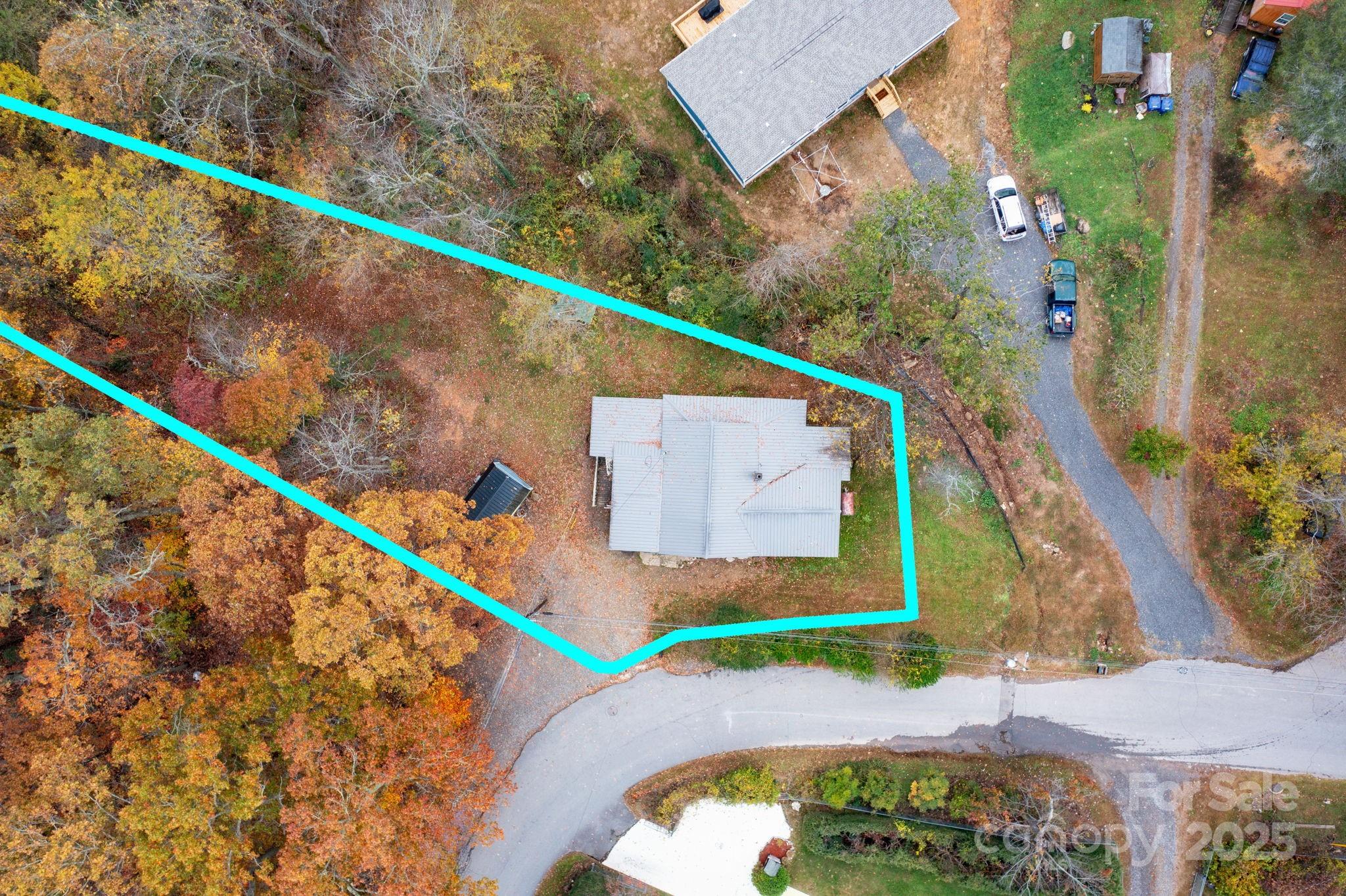 Great opportunity for investors and builders to bring their imagination and their tools! This .42 acre lot is located a short walk to Lake Tomahawk and the tennis courts and less than a mile from downtown Black Mountain. Keep as one lot or subdivide. Black Mountain zoning has confirmed possibility of three lots with UR8 zoning. Lots would require a shared driveway if you do three lots. House needs complete renovation or it could remove from the property and start fresh. The original home is block construction could keep it and build up. Sewer line has a pump system installed by town of Black Mountain. Utilities are connected. The Square footage is approximate.  No survey on file. Sold As is -no repairs.