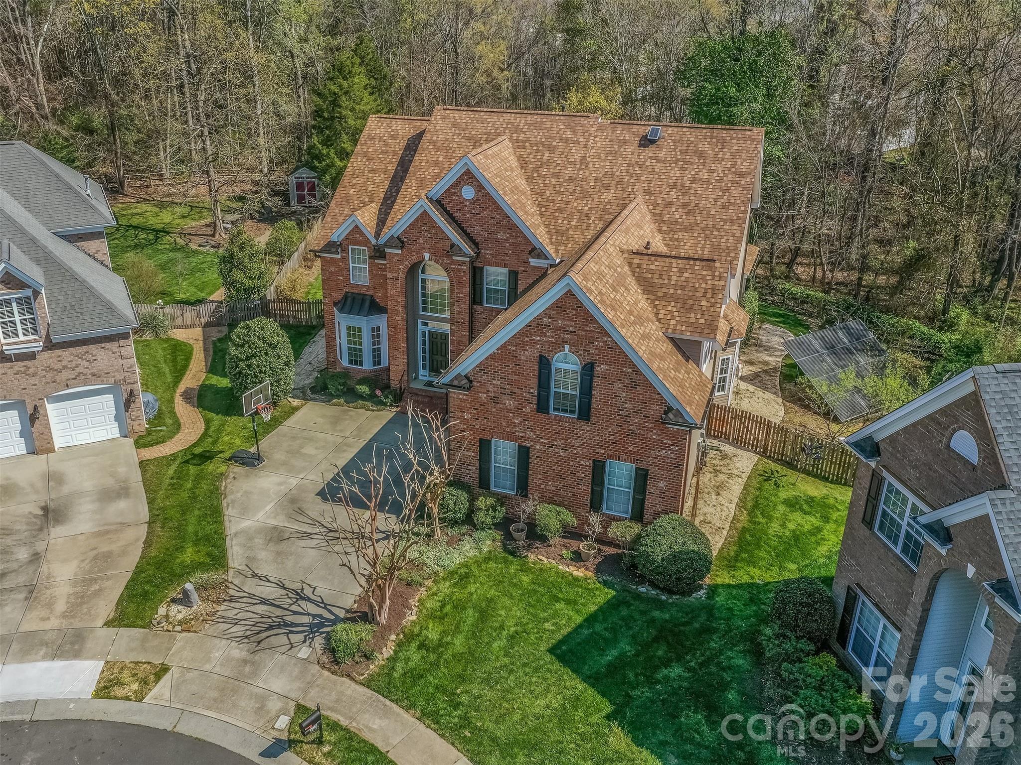 Don't miss your opportunity to own in one of Ballantyne's Premiere Communities of Providence Pointe.  This amazing cul-de-sac lot is one of the largest in the community, is fenced, & is completely private! The entire interior has been freshly painted and is move-in ready!  The floorplan is fantastic with dramatic 2 story foyer that flows into the formal dining room & formal living room that has vaulted ceiling!  The great room & kitchen are perfect for entertaining & the kitchen boasts granite countertops, breakfast bar & island.  The great room has gas log fireplace & has access to the spectacular screened porch where you will spend most of your time!  The main floor also features a guest bedroom with access to a full bath.  The oversized primary suite is on the 2nd floor & has a large primary bath with dual vanity, walk-in shower, garden tub, & large walk-in closet.  The 2 guest rooms are also spacious & have access to a large guest bath.  There is also a large bonus room that is perfect for a home theatre, game room, or possibly a 5th bedroom.  The home also features solar panels that are adjacent to the home & fully paid for.  As a new owner you will enjoy all of the benefits of free energy & none of the costs!  The more than 1/2 acre lot backs up to lots of wooded space & has a lovely garden ready for Spring Planting.  Providence Pointe has an unparalleled community amenity with clubhouse, pool, slide, splashpad, playground, tennis courts, & sport court!  All located conveniently to all that Ballantyne has to offer!  Make this your next home today!