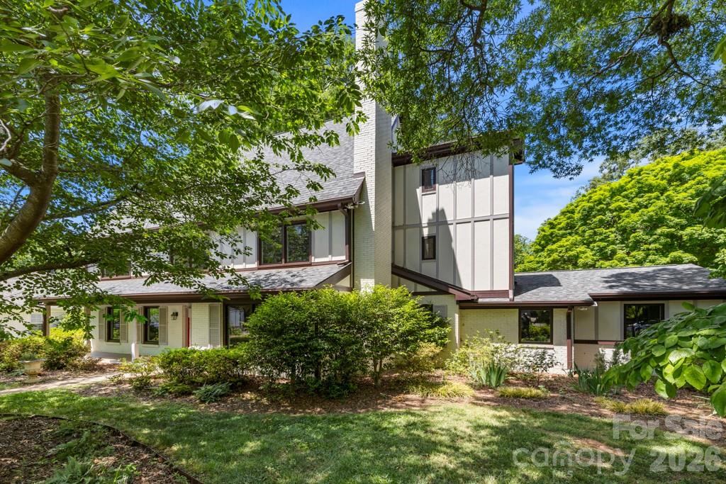 Welcome home to this classic two-story residence with elevator in the established Lansdowne community, where timeless charm meets a flexible and functional layout on a generous 0.47-acre corner lot. Offering space to live, work, and entertain with ease, this home blends traditional design with everyday comfort.

Unfinished third floor with direct elevator access offers over 1,000 sq feet of unbelievable storage opportunities. 

From the moment you enter, you’ll appreciate the inviting flow featuring a formal living room and dining room, ideal for both hosting and daily living. The warm and welcoming den with built-ins and a fireplace serves as the heart of the home and connects seamlessly to the kitchen and breakfast area, creating an easy, natural flow throughout the main living spaces.

The main level features a 2nd primary suite providing excellent flexibility for guests, a home office, or multi-generational living. Upstairs, you’ll find 3 additional bedrooms, including a spacious primary suite enhanced by a 5th bedroom that has been transformed into an expansive walk-in closet.   Exceptional storage and organization.

Step outside to enjoy the mature, tree-lined yard on nearly half an acre, with ample space for outdoor living, gardening, or entertaining.

Located in the highly desirable Lansdowne neighborhood, known for its established charm, large homesites, and prime location just minutes from SouthPark, shopping, dining, and everyday conveniences, this home offers the perfect blend of character, space, and location.