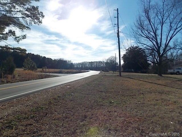 Nice 1+/- Acre lot w/well & septic. Double wide had fire, owners do not know if salvageable or not. Property sold AS-IS, where is. Cash only.