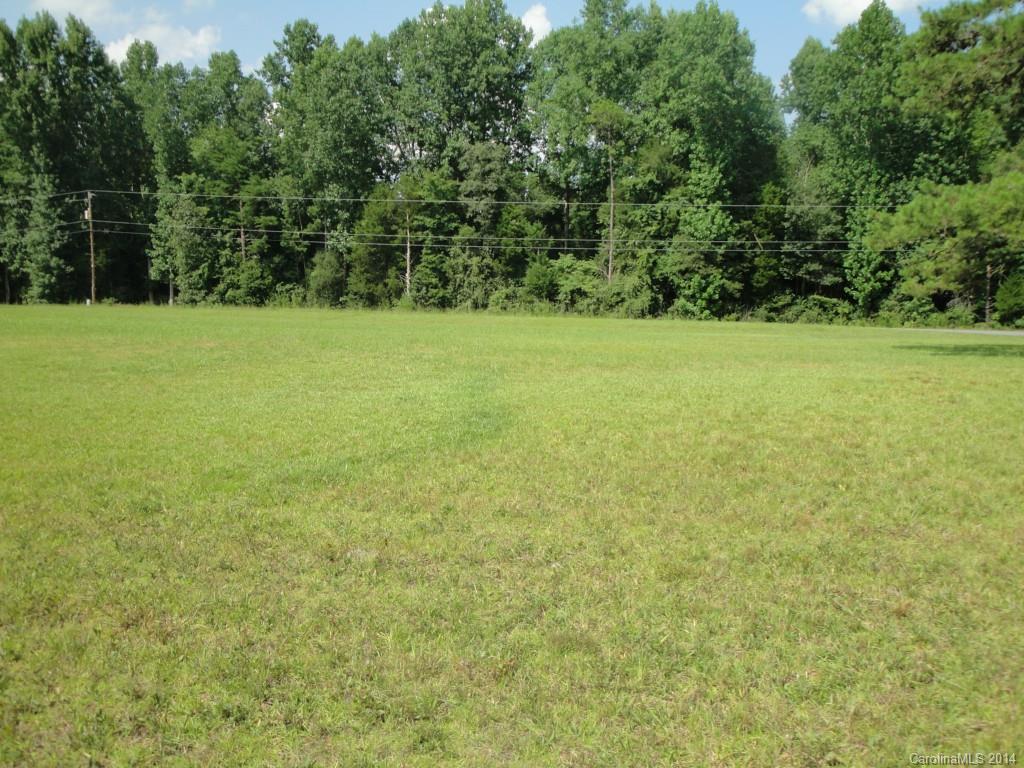 WON'T LAST LONG!!!   Almost an acre in Fort Mill.  Flat cleared lot only 1.66 miles to new Fort Mill Bypass!   Build your dream home.   No HOA.  Wooded area across the street.   Peaceful and serene living.