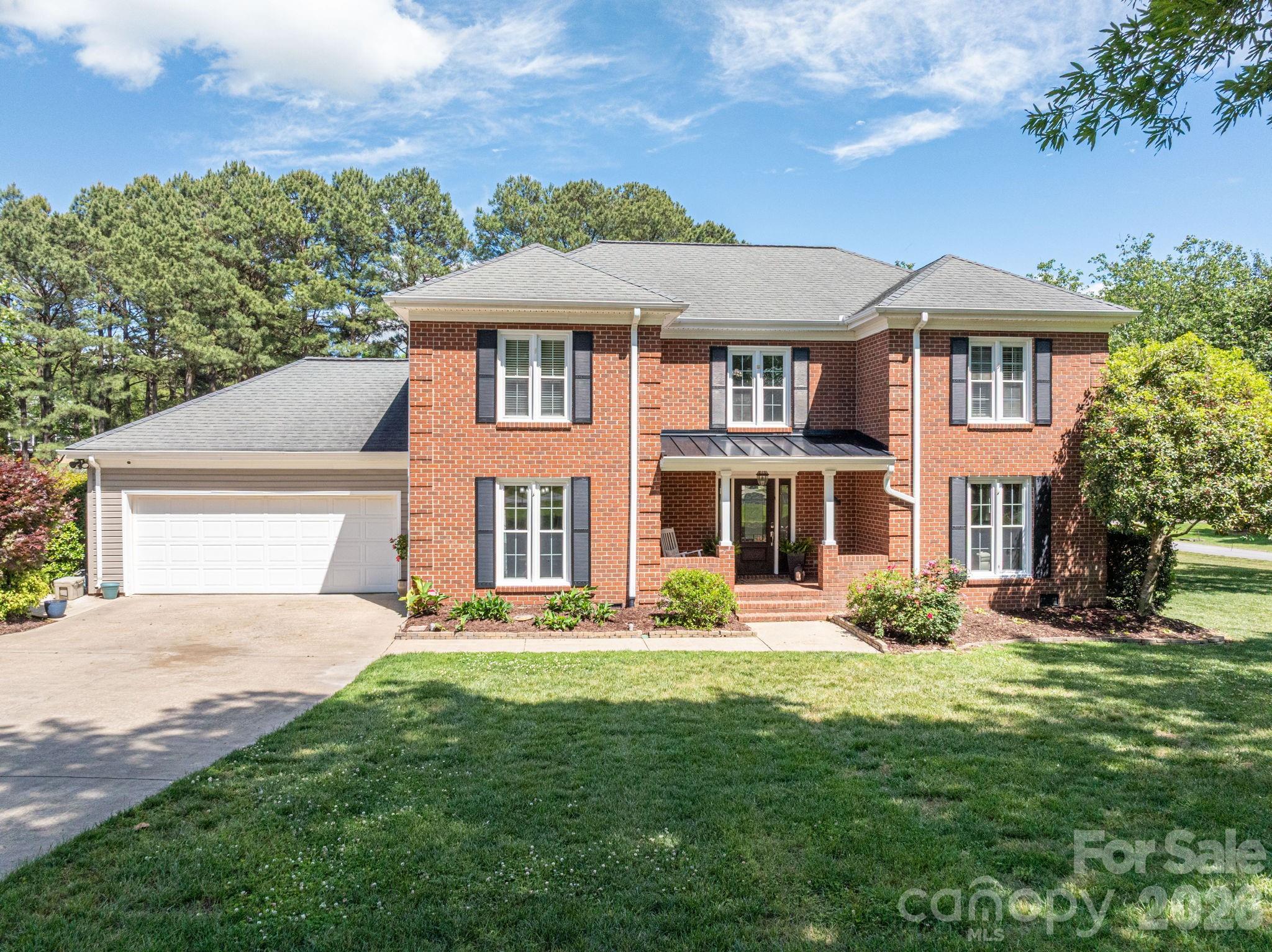 Nestled on over an acre of beautifully landscaped grounds, this timeless traditional brick home offers the perfect blend of classic charm and modern updates. From the moment you arrive, you’ll appreciate the space, privacy, and inviting curb appeal this property provides.
Step into your own private backyard oasis—designed for both relaxation and entertaining. Enjoy warm Carolina days by the in-ground saltwater pool, complemented by a hot tub for year-round enjoyment. Both the pool and hot tub are equipped for heating, allowing you to extend your outdoor living through every season. The elegant brick paver patio provides the perfect space for gatherings, all surrounded by a full brick privacy fence that creates a peaceful, resort-like setting.
Inside, the main level features a versatile and functional layout. The recently updated kitchen serves as the heart of the home, complete with newer appliances, ample workspace, and a layout that flows seamlessly into the living areas. A spacious family room offers the perfect place to gather, while an additional den provides flexibility as a home office, second living space, or formal dining room.
Upstairs, you’ll find four generously sized bedrooms, including a spacious primary suite designed for comfort. The primary bedroom features a large walk-in closet and a beautifully renovated bathroom with a soaking tub, tile finishes, and updated vanities—creating a true retreat. Additional bathrooms throughout the home have also been tastefully updated with new vanities and tile flooring, providing a cohesive, move-in-ready feel.
This turnkey home has been thoughtfully maintained and updated, offering both style and functionality for today’s lifestyle. With over an acre of land, multiple living spaces, and an exceptional outdoor setup, this property is a rare opportunity to enjoy space, privacy, and comfort—all in one.
Ready for its next owner, this home is the perfect place to create lasting memories.