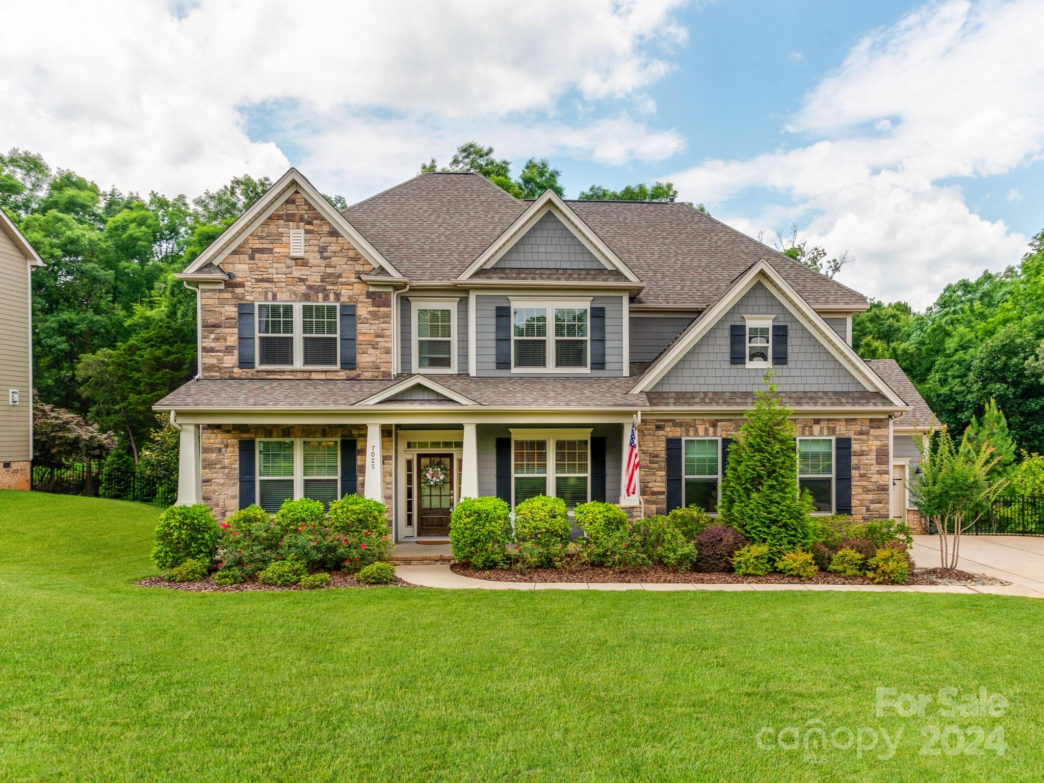 Comps Support 950k+ in Top School District! Walking distance to Marinas, Lakefront Restaurants, and Lake Wylie! Beautiful Custom Luxury 5-bed Home nestled on a large private cul-de-sac lot with seasonal Lake Views, & located in the most Well-Sought-After community in Lake Wylie, Heron Cove!  There is a secondary suite on the main floor along w a primary suite & additional bedrooms on the second floor. The home offers wide hallways & tall ceilings giving it that open and airy feel to it with plenty of natural light. The beautiful Chefs kitchen has a massive spread overlooking the Breakfast room, Great room, & outside deck areas! The upgraded bathrooms have quartz countertops, upgraded tile floors, & nice finishes! The Basement offers a huge display great for a media room, play area, wine cellar, & even another living quarters w the full bathroom.You can enjoy the Lake Lifestyle at the neighborhood Kayak Shoot, & walking distance to Marinas, Restaurants, & Top Ranked School Systems.