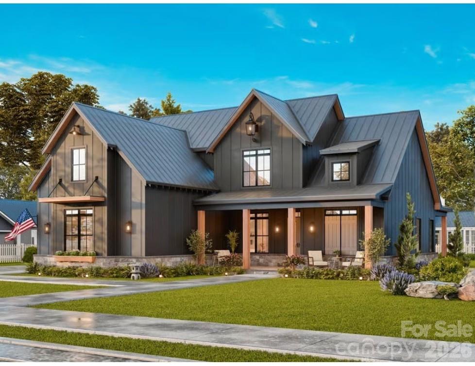 Welcome to 10115 Jim Sossoman Road in beautiful Midland, NC — a stunning custom-built home by Thayer Contracting Inc. and builder Chris Thayer, located in the desirable Rosewood Trail community. This thoughtfully designed Cranberry Garden Plan offers exceptional craftsmanship, designer finishes, and incredible indoor and outdoor living spaces on a spacious 1-acre lot.
The inviting 257-square-foot covered front porch welcomes you into a gorgeous open floor plan featuring a breathtaking family room with cathedral ceilings, a cozy fireplace, and a dramatic wall of windows overlooking the peaceful backyard and natural surroundings. The oversized chef’s kitchen is truly the heart of the home with an impressive island, designer touches, abundant cabinetry, and seamless flow into the dining and living areas — perfect for entertaining and everyday living.
The luxurious primary suite overlooks the expansive covered back porch and features a spa-inspired bath designed for relaxation. Enjoy over 708 square feet of covered outdoor living space ideal for entertaining guests or simply unwinding in the private backyard setting.

Additional highlights include a custom laundry room with built-ins and exterior access, two spacious upstairs bedrooms each with access to full baths, and a versatile bonus room that could serve as a media room, playroom, or additional bedroom.

Rosewood Trail offers beautiful surroundings and a community walking trail while being conveniently located near Rob Wallace Park, shopping, dining, and easy access to surrounding areas. This custom beauty truly combines luxury, comfort, and peaceful country living with modern convenience.
