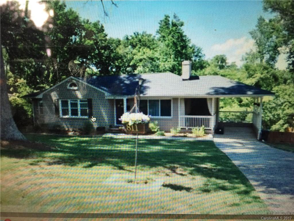 Gorgeous Ranch Home Completely Remodeled with Fully Finished Walkout Basement! Large Great Room with Gas Log Fireplace, Beautiful Granite Kitchen has Work Island & Dining Area. Hardwood Floors & Large Tile Throughout. Three bedrooms on the main level and Two Additional Spacious Bedrooms with Full Bath Downstairs for a Total of   5BR/3BA !  Sandpaper Patio Area, Storage Shed, Covered Side Porch and Attached Carport. Must See-Great Space with Lots of Character! Easy Access to I-77 & Shopping.