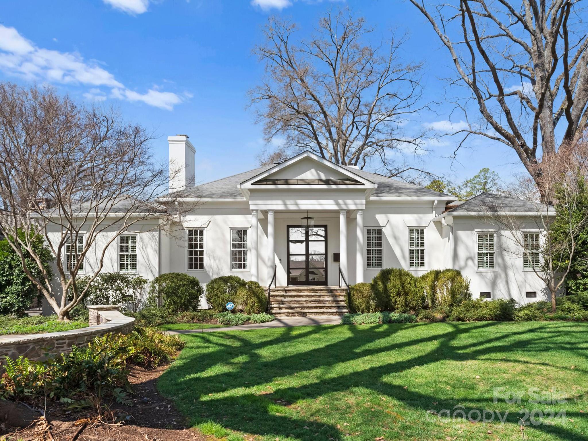 Gorgeous renovated one level home on a large over half acre lot in Myers Park and just minutes to SouthPark. The covered front porch leads to a beautiful new aluminum & glass front door. White oak wide plank flooring throughout. Impressive ceiling heights of 10, 11 and 14 feet. Custom lighting throughout. Three fireplaces w/ marble and soapstone surrounds. The kitchen is open to the family room and offers a large center island, quartzite countertops, Wolf range & double oven, Wolf microwave, Cove dishwasher & Sub-Zero paneled full length fridge/freezer. The scullery has an abundance of countertops, wine refrigerator and a beverage drawer. Custom cabinetry w/ lighting. There are 5 total bedrooms. The guest house has a kitchenette, additional living space and a renovated full bath. The primary bedroom has a beautiful renovated bath w/ gorgeous tile selections, separate tub and water closet. Prepare to be impressed by the custom primary closet. This home is a true pleasure to show!