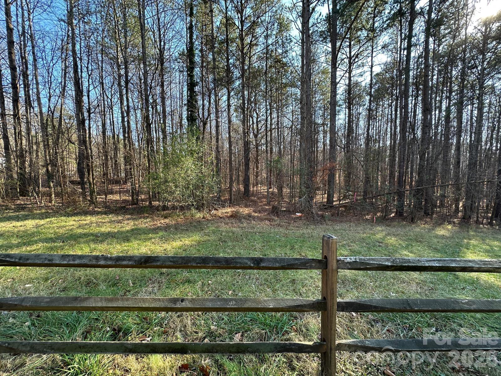 Great location and beautiful wooded 3.44 acres of land surveyed with non-expiring septic permit ready for you to build your dream home now or hold for later. This listed lot is one lot out of a total of 4 large building lots adjacent to each other. Preliminary work has been done with the surveyors, sellers and NCDOT to evaluate driveway location. Most of the work has been done for you!! Country like private setting with multiple possibilities. Easy 15-minute drive into Monroe and surrounding areas. More information to come!!