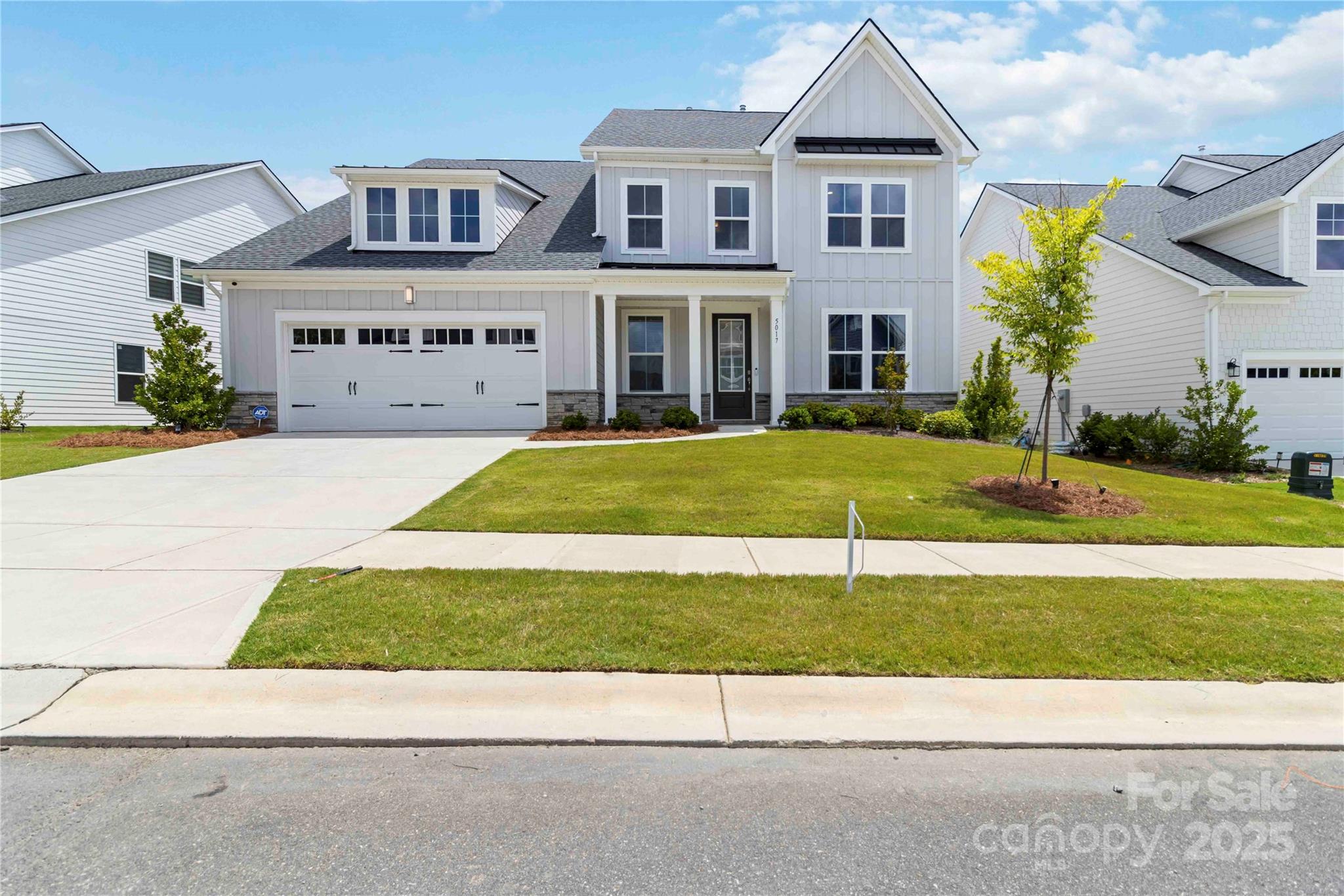 Welcome Home! A beautifully maintained 5-bedroom, 4.5-bathroom home nestled in the heart of Fort Mill. This spacious residence offers thoughtful design and modern comfort with a flexible floor plan perfect for today’s lifestyle. Step inside to find a chef’s kitchen equipped with high-end appliances, ample counter space, and a large island that’s ideal for entertaining. The main level features a full bedroom with an ensuite bath, providing the perfect setup for guests or multi-generational living. Upstairs, you'll find generously sized bedrooms, including a luxurious primary suite, and additional bathrooms to accommodate the whole family with ease. Enjoy outdoor living in the fully fenced backyard perfect for play, pets, or peaceful evenings under the stars. Located in a desirable community with top-rated schools, this home offers the perfect blend of comfort, function, and style. Don’t miss the chance to make this Fort Mill gem your own!