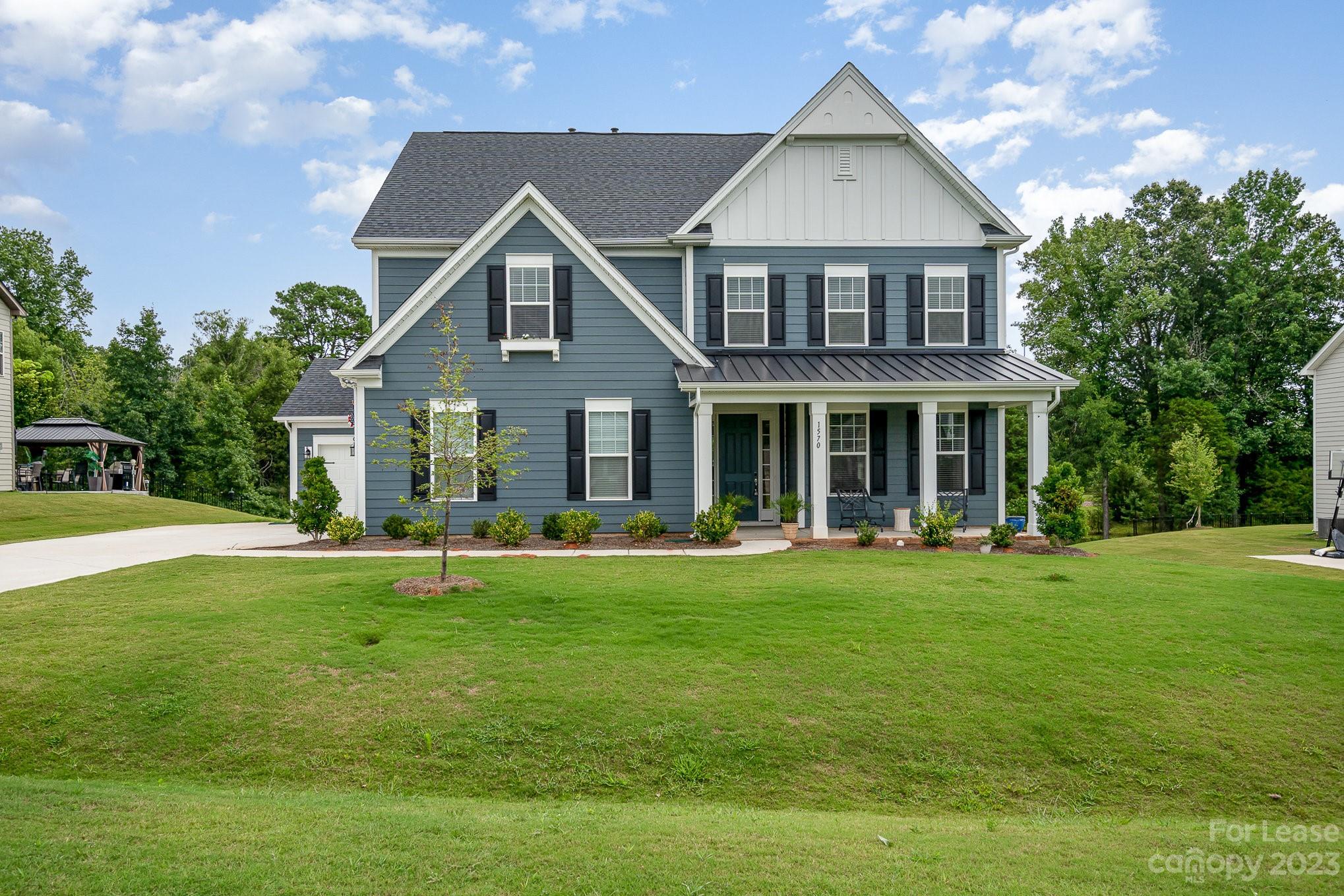 Built in 2021, this stunning Taylor Morrison home offers you 5 beds & 3 baths, and is situated on a .5 acre cul-de-sac lot with a 3-car garage! This home is a true entertainer's paradise! Welcome your guests in through your spacious & covered front porch, into the main level, featuring 10' ceilings and wood laminate flooring throughout. The kitchen is well appointed, featuring a massive island, upgraded cabinetry, SS appliances, subway tile backsplash & a butler's pantry, and is open to your breakfast area and large living room! The main level also provides a bedroom & full bath, offering your guests privacy and separation when they come visit. Upstairs, you will find the primary retreat, complete with a large & resort style en-suite bathroom, as well as a massive walk-in closet with space for everything! The 3 remaining secondary bedrooms upstairs are all spacious & share a full bathroom. Conveniently located close to shopping, dining & Lake Wylie!
