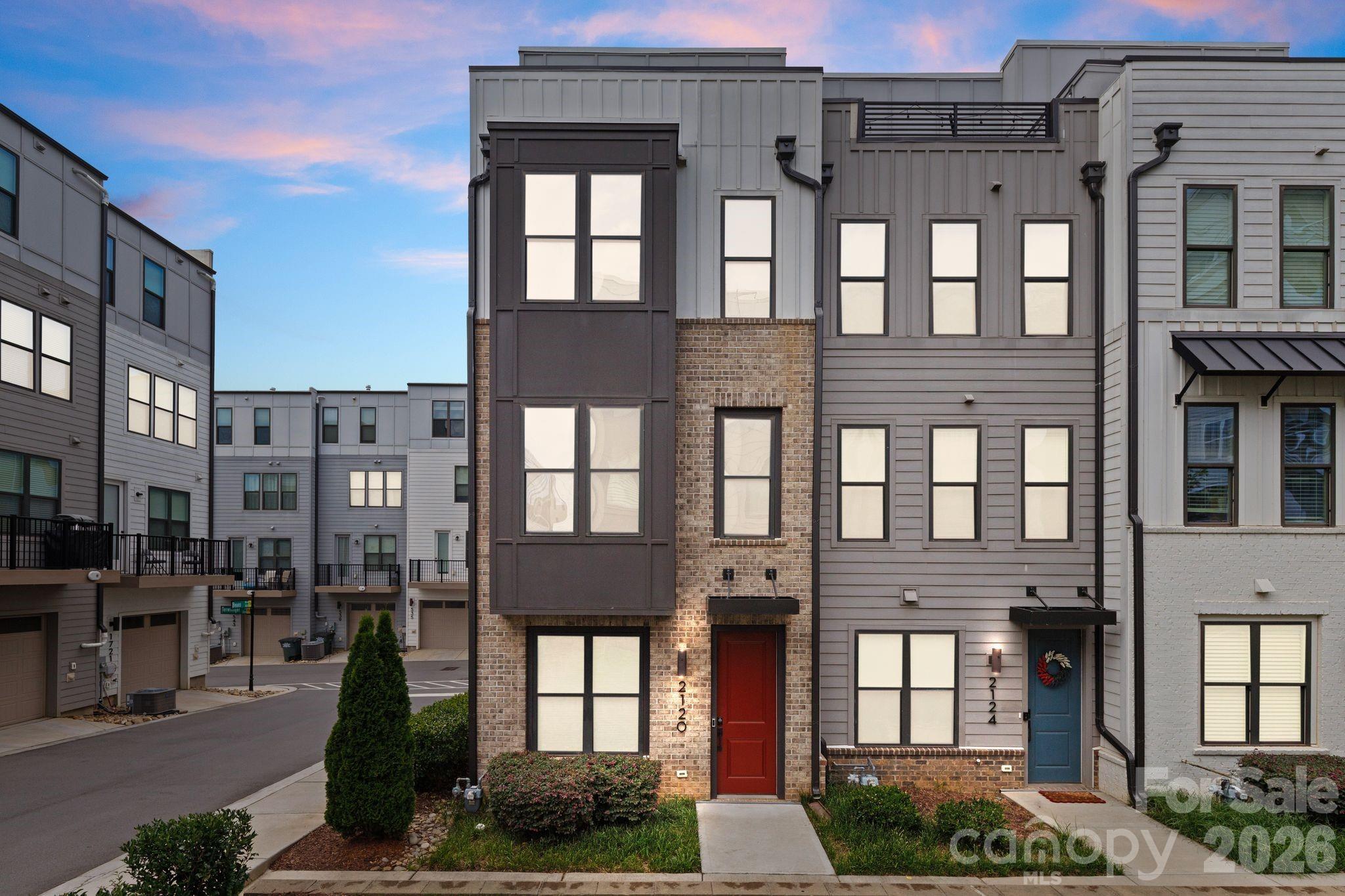 Location, lifestyle and convenience. Three words that distinguish this spectacular END UNIT townhome positioned next to all the South End hot spots. This location offers easy access to Uptown, LoSo, Charlotte Douglas airport, 1-77, & major hospital systems. Unique highlights include a two car garage, private rooftop terrace plus a built-in bar in the bonus room. Built in 2022, this home offers sleek, contemporary finishes, a spacious open-concept layout, and abundant natural light throughout. Sizable and functional bedrooms each with their own private ensuite bathroom. Well-maintained throughout, interior walls and trim were freshly painted. Rapid commercial and residential development is happening in every direction around this community. More specifically, the closest parcel at the corer of S. Tryon and Remount Road is getting overhauled for a major expansion of high-end retail and residential development. This home is just steps away from Charlotte's top restaurants, shopping, and nightlife. Enjoy the perks of a vibrant, walkable neighborhood with a welcoming community atmosphere and access to a community dog park.