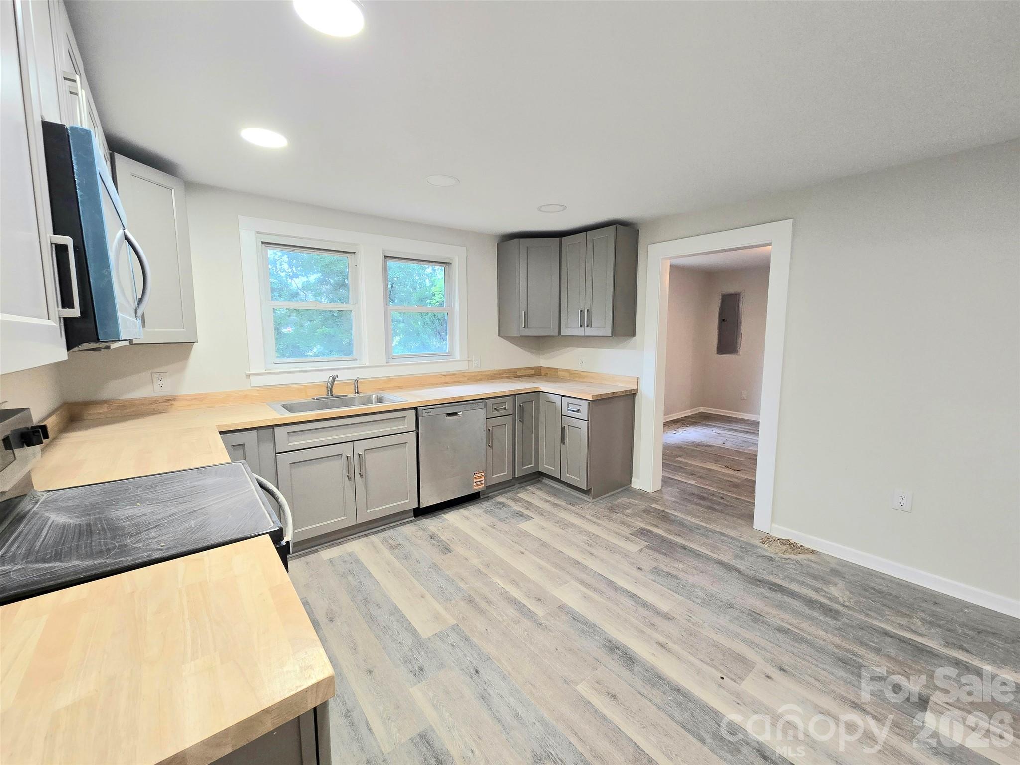 NEW PRICE – $204,250! Looking for a move-in ready 3-bedroom home in Hickory, NC? Welcome to 357 8th Avenue Dr SW, a beautifully updated home offering 1,442 square feet of comfortable living space. Recent improvements include a new roof (2026), new flooring, fresh interior paint, and an updated kitchen featuring new cabinets, sink, dishwasher, microwave, and range. The bathroom has also been refreshed with a new vanity, toilet, tub, and surround. This affordable Hickory home combines modern updates with everyday convenience, making it an excellent option for first-time homebuyers, downsizers, or investors. Agent related to seller. Conveniently located near shopping, dining, schools, and major commuter routes, this property offers exceptional value at its new price.