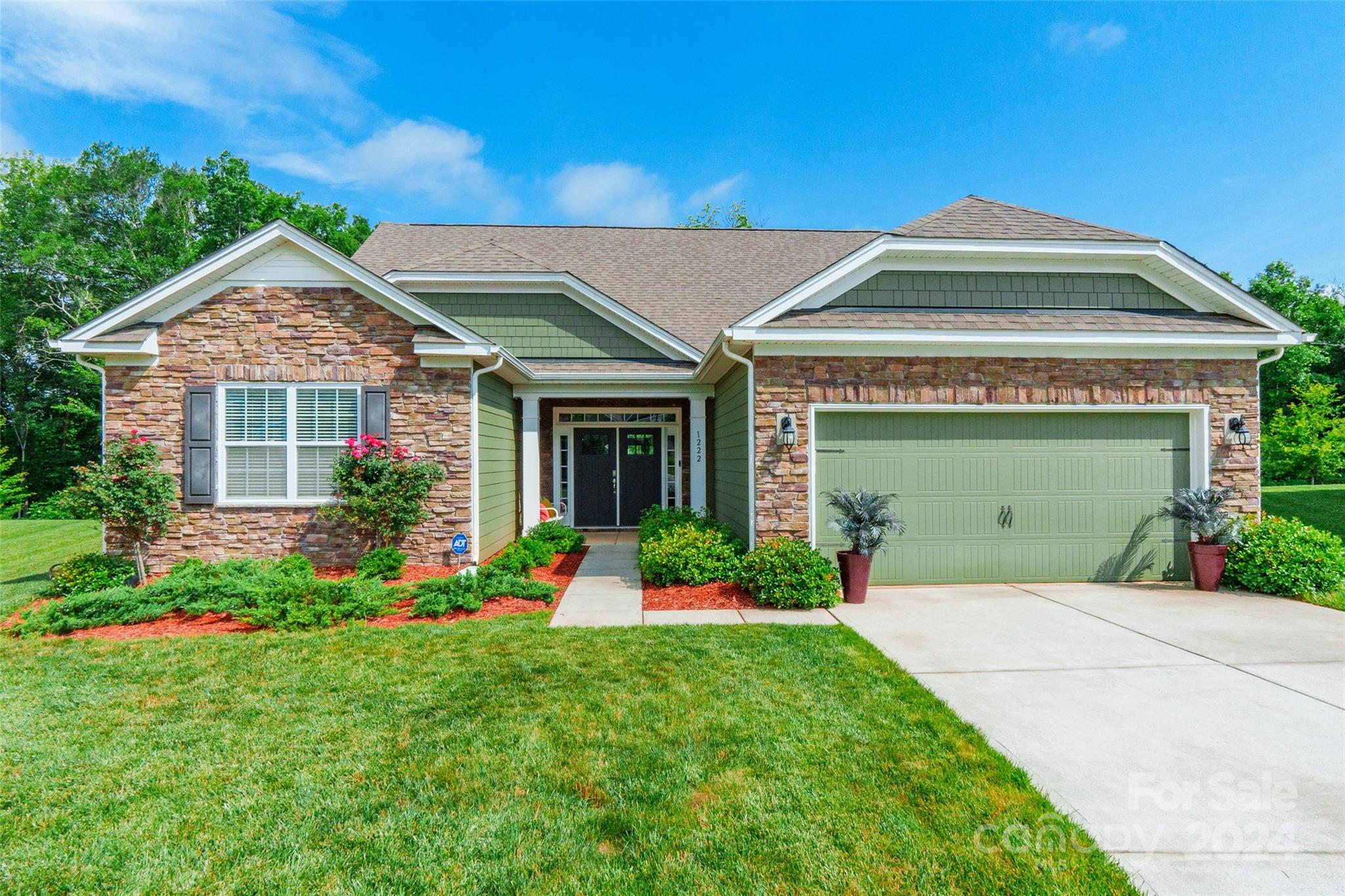 Stunning 5 bedroom, 3.5 bathroom home nestled on a peaceful cul-de-sac with gorgeous curb appeal & an inviting front entry foyer. Step inside to discover 11ft ceilings and an open, bright floor plan, complete with a kitchen featuring granite countertops, a breakfast bar, a walk-in pantry, and top-of-the-line SS appliances. The kitchen overlooks the great room, highlighted by a cozy fireplace. The main level also hosts 3 bedrooms, including a luxurious primary suite with tray ceilings, an ensuite bathroom with dual vanity, and an oversized shower. An additional office space off the dining room provides flexibility. Upstairs, 2 more bedrooms and a generous bonus room await. Outside, a covered patio & stone firepit offers an ideal space for outdoor relaxation. Other notable features include, epoxy flooring in garage, surround sound system, clean water system & patio has a natural gas connection for a grill. Perfectly situated near Lake Wylie, this home offers both elegance & comfort!