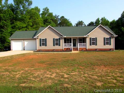 Two years young and waiting for you! Extremely well maintained sought after ranch style with over 1.5 acre corner lot sitting almost across from Springlake Golf Course. Home offering 3BR/2BA, split bedroom plan, vaulted family room, spacious bedroom sizes, hardwoods and a great kitchen for the cook. Close to schools, shopping and healthcare. USDA approved.