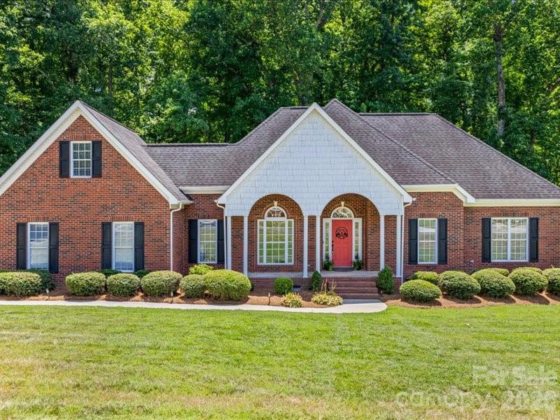 Nestled on 2.7 private acres, this exceptional 3-bedroom, 2-bathroom home offers the perfect blend of comfort, style, and peaceful surroundings. Thoughtfully maintained and designed for everyday living, you’ll immediately notice the beautiful hardwood floors, inviting open layout, and quality finishes that make this home truly stand out.

The gourmet kitchen is the centerpiece of the home, featuring quartz countertops, a large center island, a pantry, stylish tile backsplash, and an abundance of cabinet space. It seamlessly opens to the spacious great room with a cozy gas log fireplace and a sun-filled breakfast area, creating the perfect space for everyday living and entertaining.

The spacious primary suite offers a peaceful escape with a spa-inspired ensuite featuring dual vanities, a relaxing garden tub, a separate walk-in shower, and a generous walk-in closet. Upstairs, the finished bonus room above the garage includes its own heating and air unit, making it ideal for a home office, media room, playroom, or guest space.

Step outside and enjoy the beauty and privacy of your expansive 2.7-acre property, surrounded by mature trees and tranquil woodland views. Offering the perfect blend of comfort, space, and peaceful country living, this exceptional home is one you won’t want to miss.