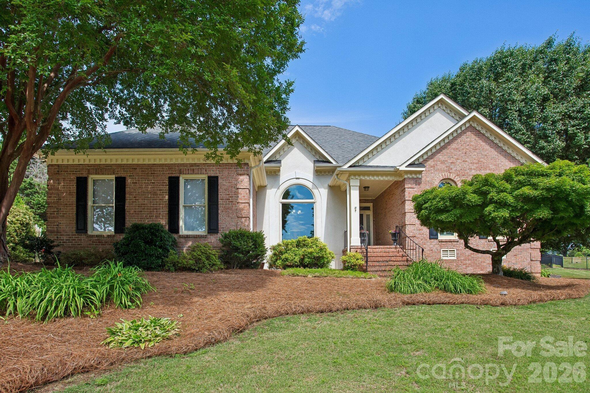 Golfer's paradise! 5 BR and 4.5 BAs in Asheford Green.  3 BRs downstairs. 2 oversized BRs, 2 BAs and Rec Room upstairs. Located on a cul-de-sac with a large fenced in yard, it is steps from the Cabarrus Country Club clubhouse and pool!  An oversized custom deck, golf cart barn and direct cart access to the course!  Updated Kitchen upstairs baths and Primary BA, ovesized garage and beautiful screened porch.  Commercial Washer & Dryer, Inside and outside refrigerators and GOLF CART ARE ALL INCLUDED!  Don't miss this opportunity to own this one of a kind dream property! Owner is licensed NC Real Estate Broker.  Rec Room and BA are approximately 400 SF of unpermitted space that was finished in 2011.