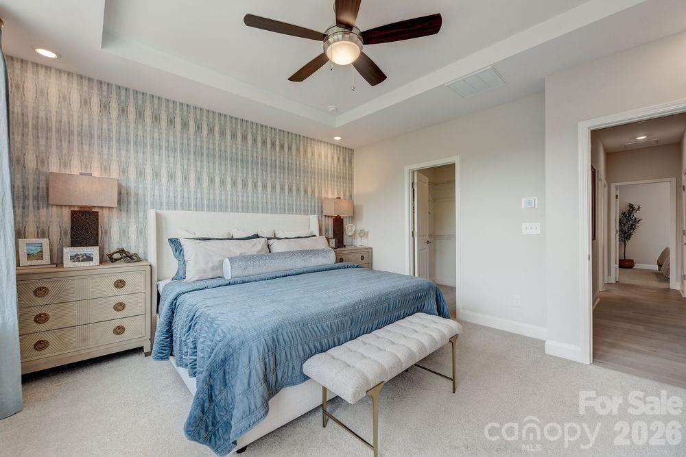 What's Special: Pond View | 1st Floor Guest Suite | 3-Story | White Cabinets. New Construction - July Completion! Built by America's Most Trusted Home Builder. Welcome to the Breckenridge II at 551 Silver Star Boulevard in Indian Trail Townhomes! This spacious 3-story townhome begins on the ground floor with a bedroom and full bath are located and the inviting foyer leads us upstairs to the main living space. The second floor features an open-concept layout with a large great room and deck, a well-appointed kitchen with a spacious center island, and a bright casual dining area with an adjacent powder room. The third floor includes three additional bedrooms, including a deluxe primary suite with dual sinks and vanities, a well-appointed shower enclosure, and a generous walk-in closet, along with the conveniently located laundry room and secondary bath. Welcome to Indian Trail Townhomes, where comfort meets convenience. Enjoy easy access to US-74 and I-485, top-rated Union County schools, and endless shopping and dining in Indian Trail and Matthews. Parks like Chestnut Square and Colonel Beatty are minutes away, with major employers, Atrium Health Union West, and popular retail centers all close by. Additional Highlights Include: first floor bedroom and full bath in place of flex and half bath, storage on second floor, shower ledge and double recessed niche at primary bath. Photos are for representative purposes only. MLS#4355782